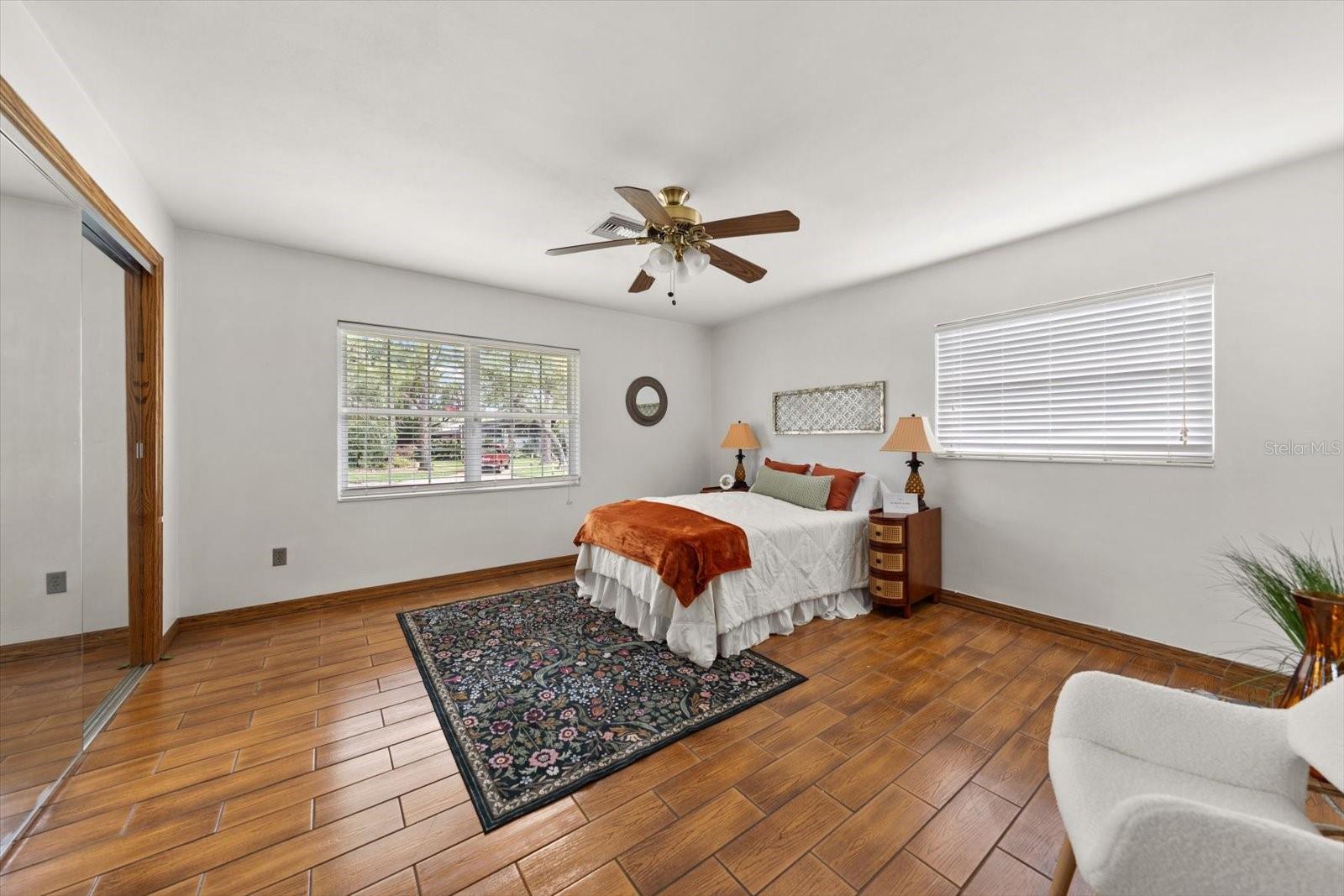 Guest bedroom number two, offers generous living space and natural light.