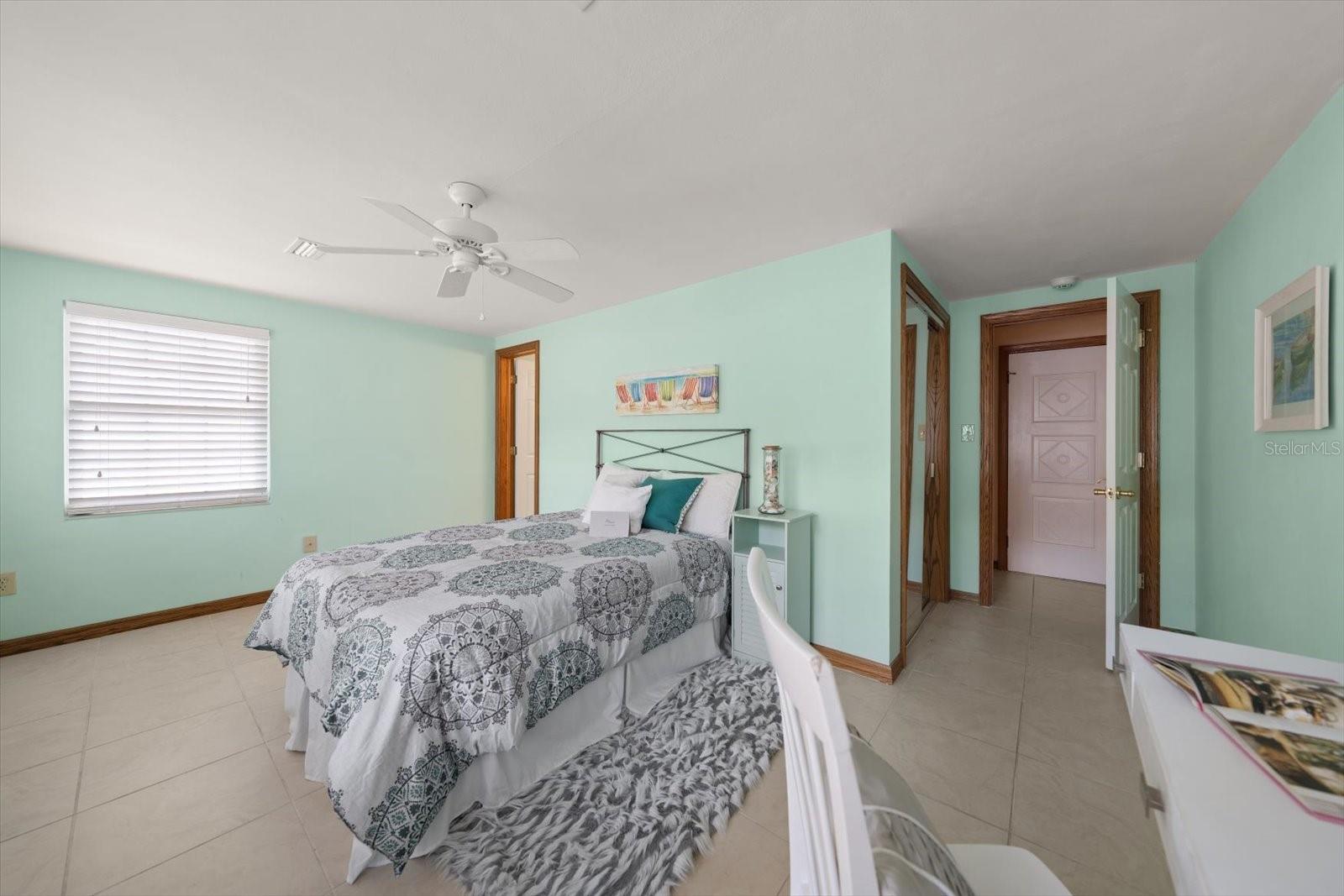 Guest bedroom number three with private bath.