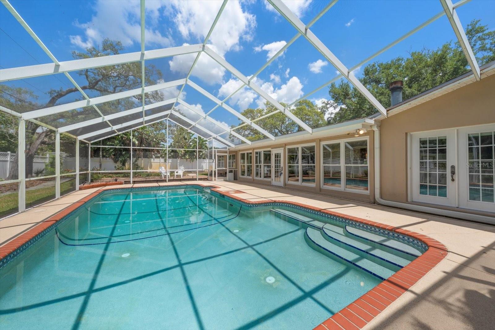 The screened pool and spa area is totally screened for all-year enjoyment!