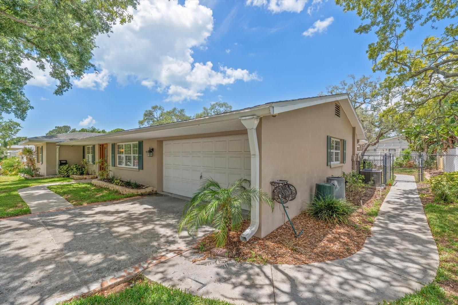 Convenient walkways are provided to easily access the private backyard.