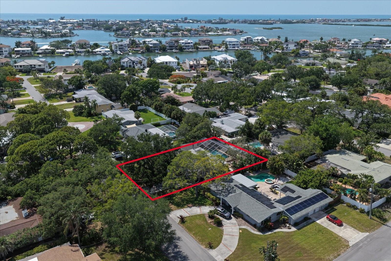 Nestled within the shaded trees, this property offers a sprawling .28 acres!