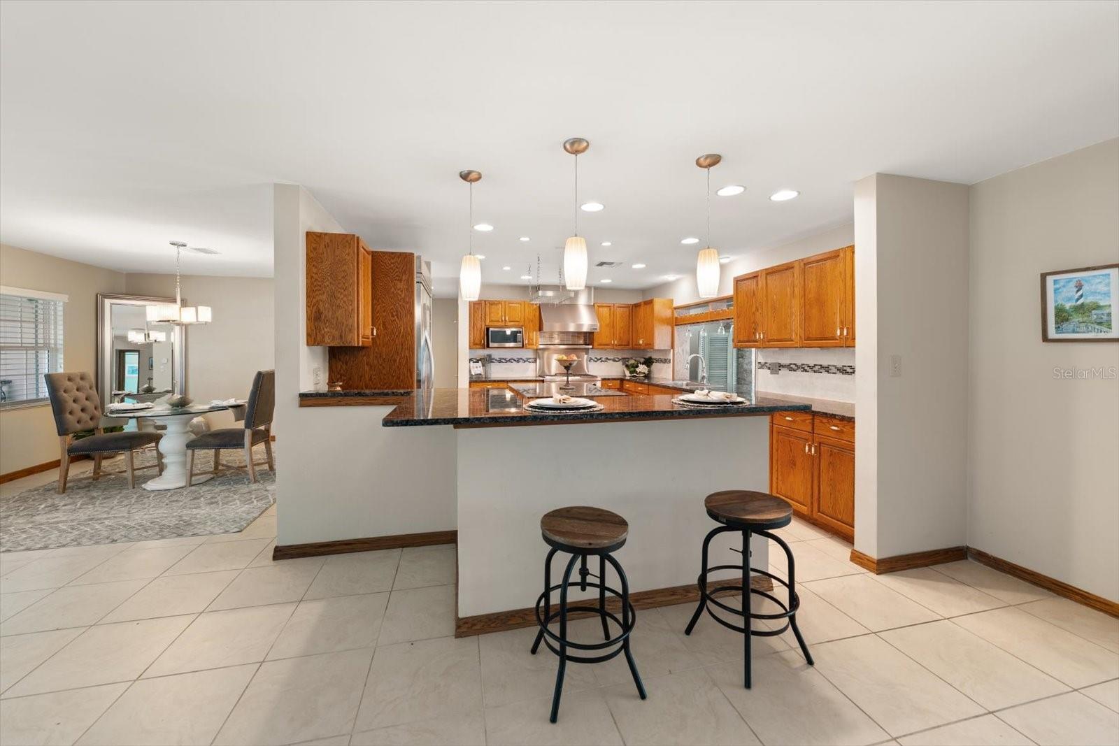 Superb chef's kitchen ideal for the fussiest cook, providing a functional layout and abundant counter and storage space.