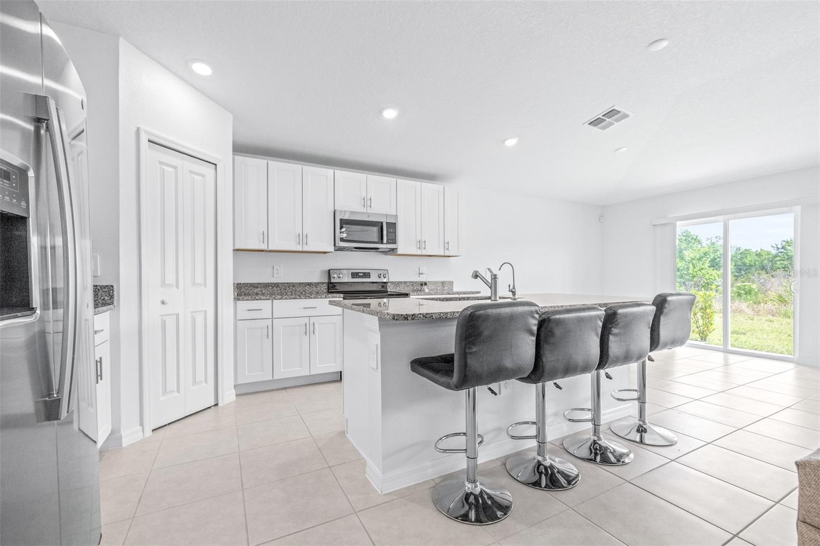 Kitchen 13x16 All Stainless Steel Appliances