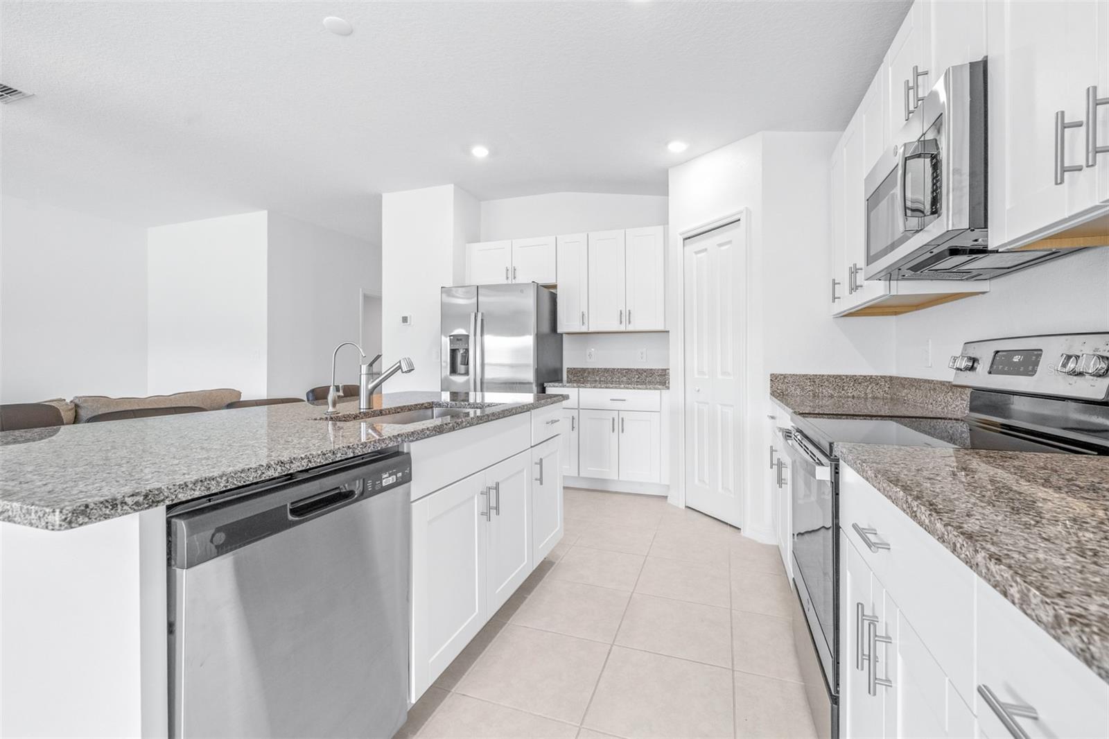 Kitchen 13x16 All Stainless Steel Appliances