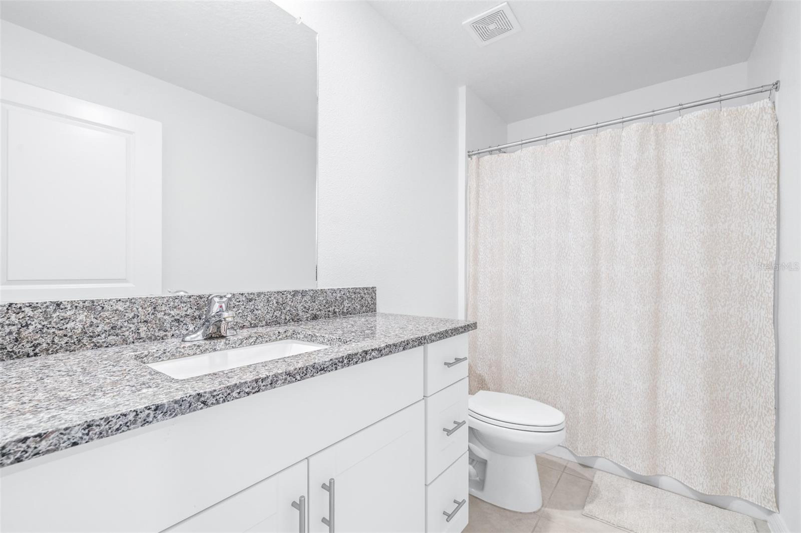 Bathroom With Linen Closet