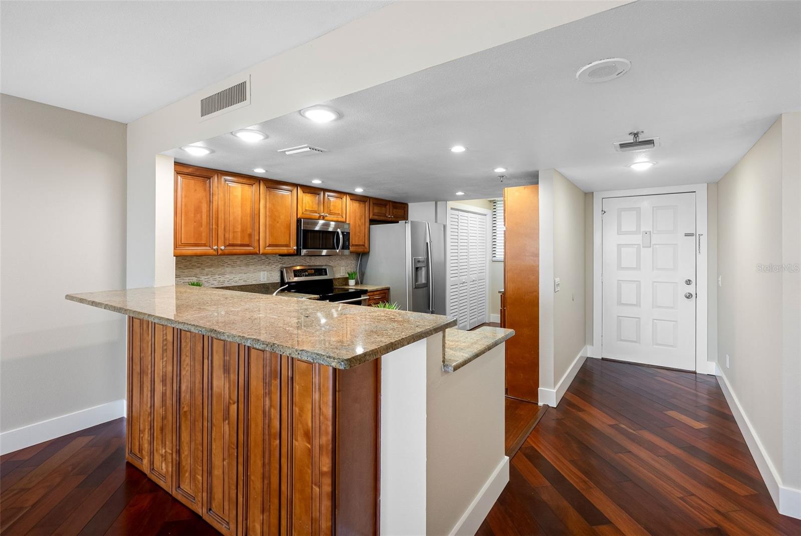 Breakfast bar with tall lower cabinets