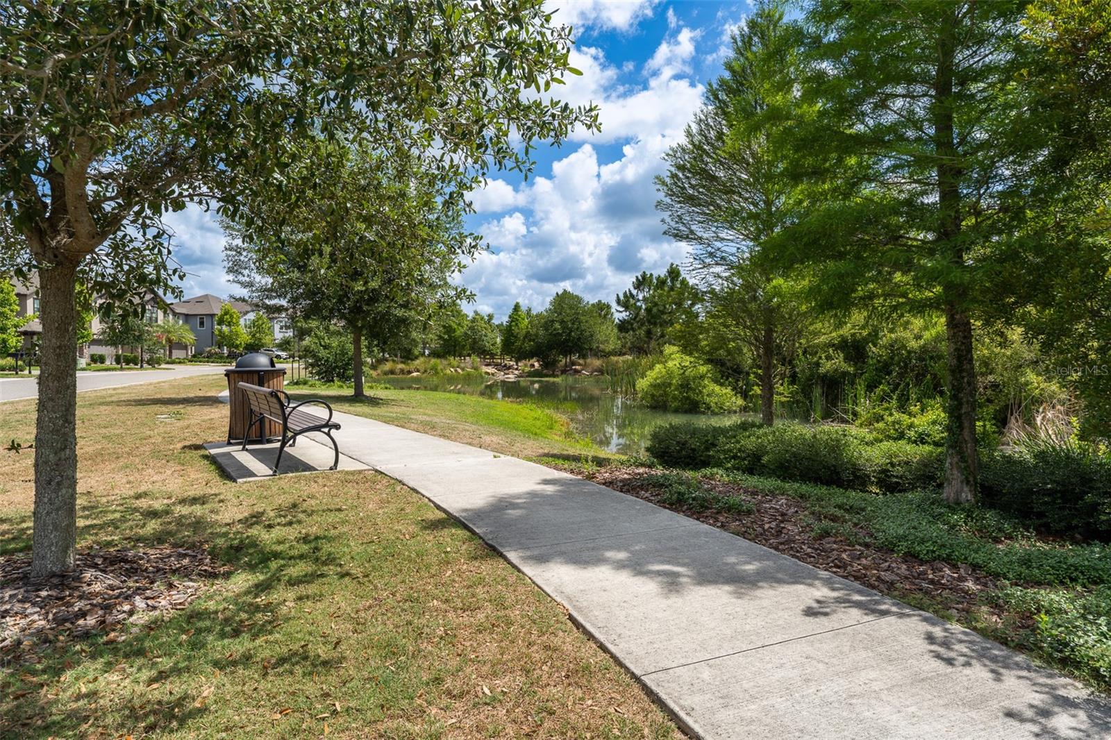 Walking path in townhouse area that meets up with neighborhood path