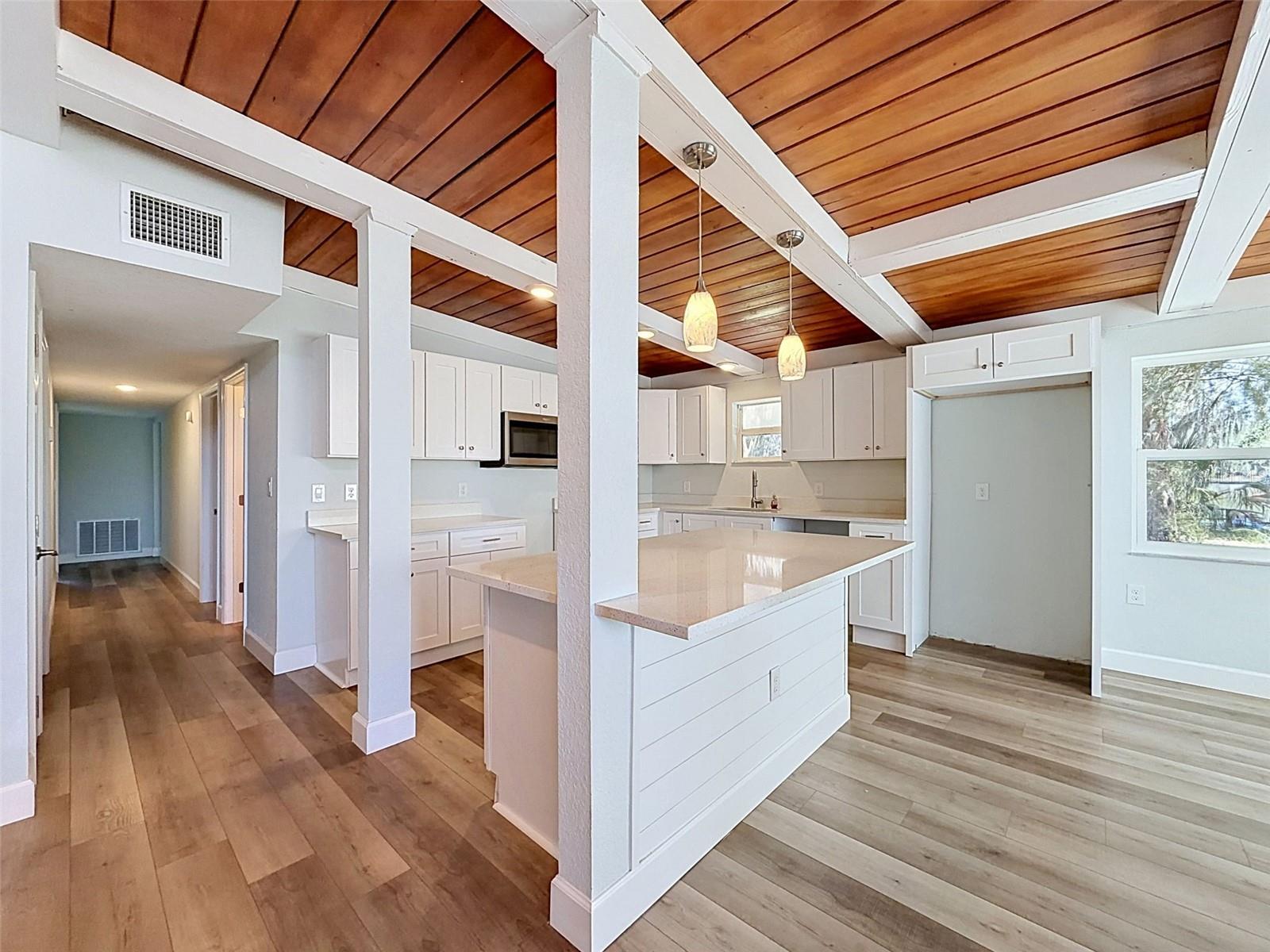 Updated kitchen blends modern finishes with classic coastal design elements.