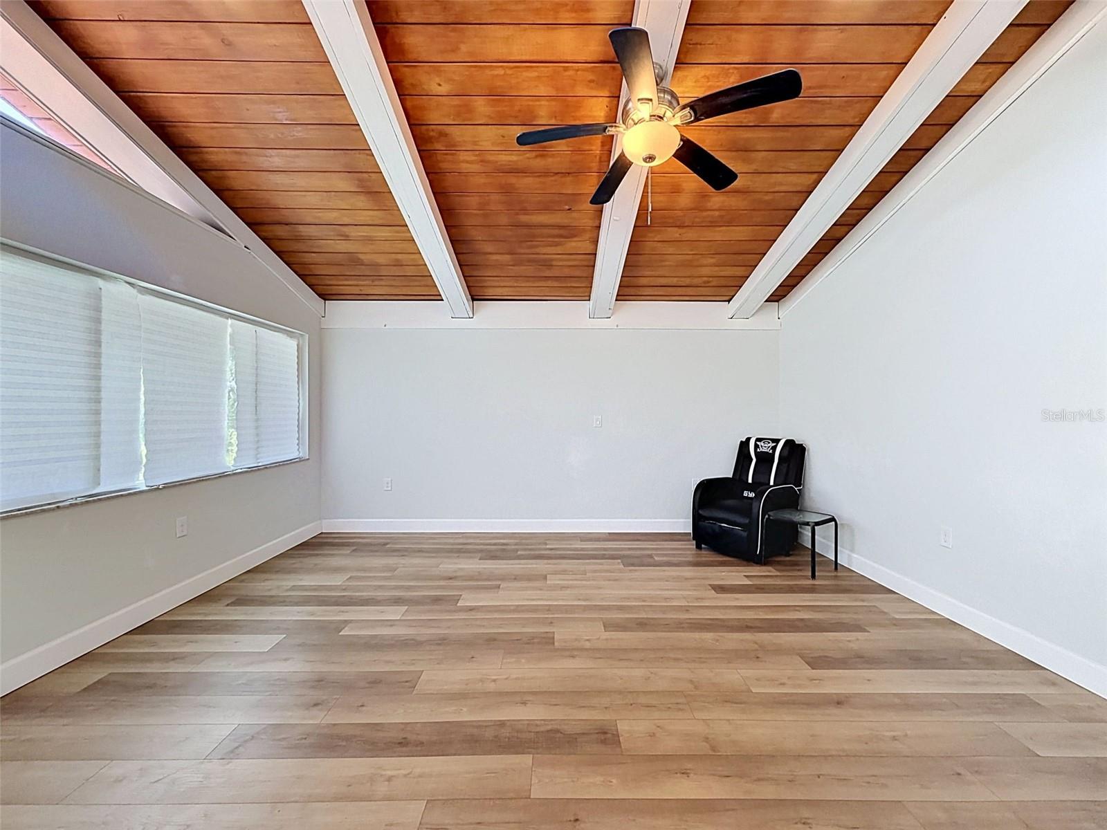 • Warm wood beam ceilings create a unique coastal character rarely found at this price point.