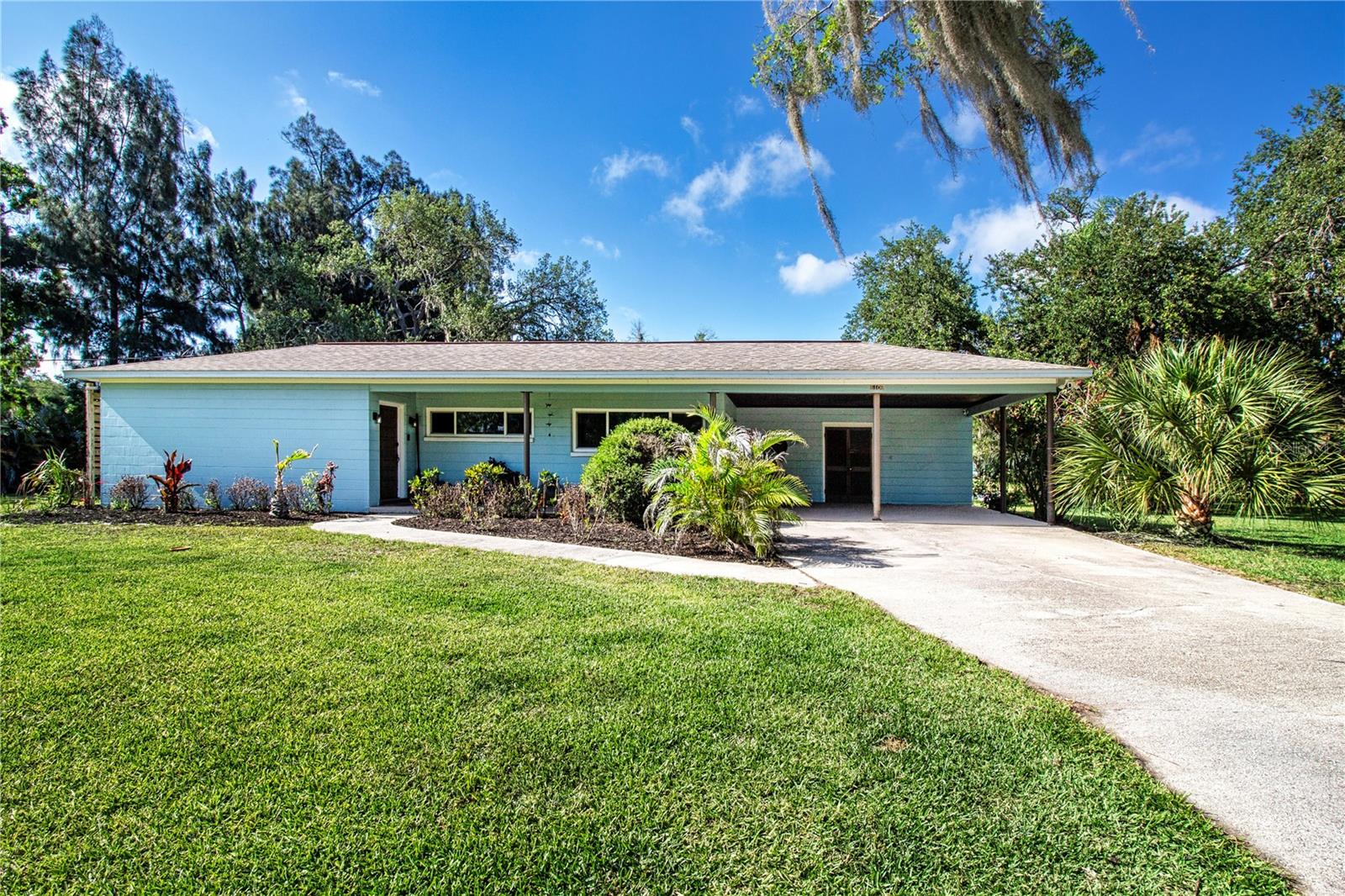 expansive front yard and view of the home
