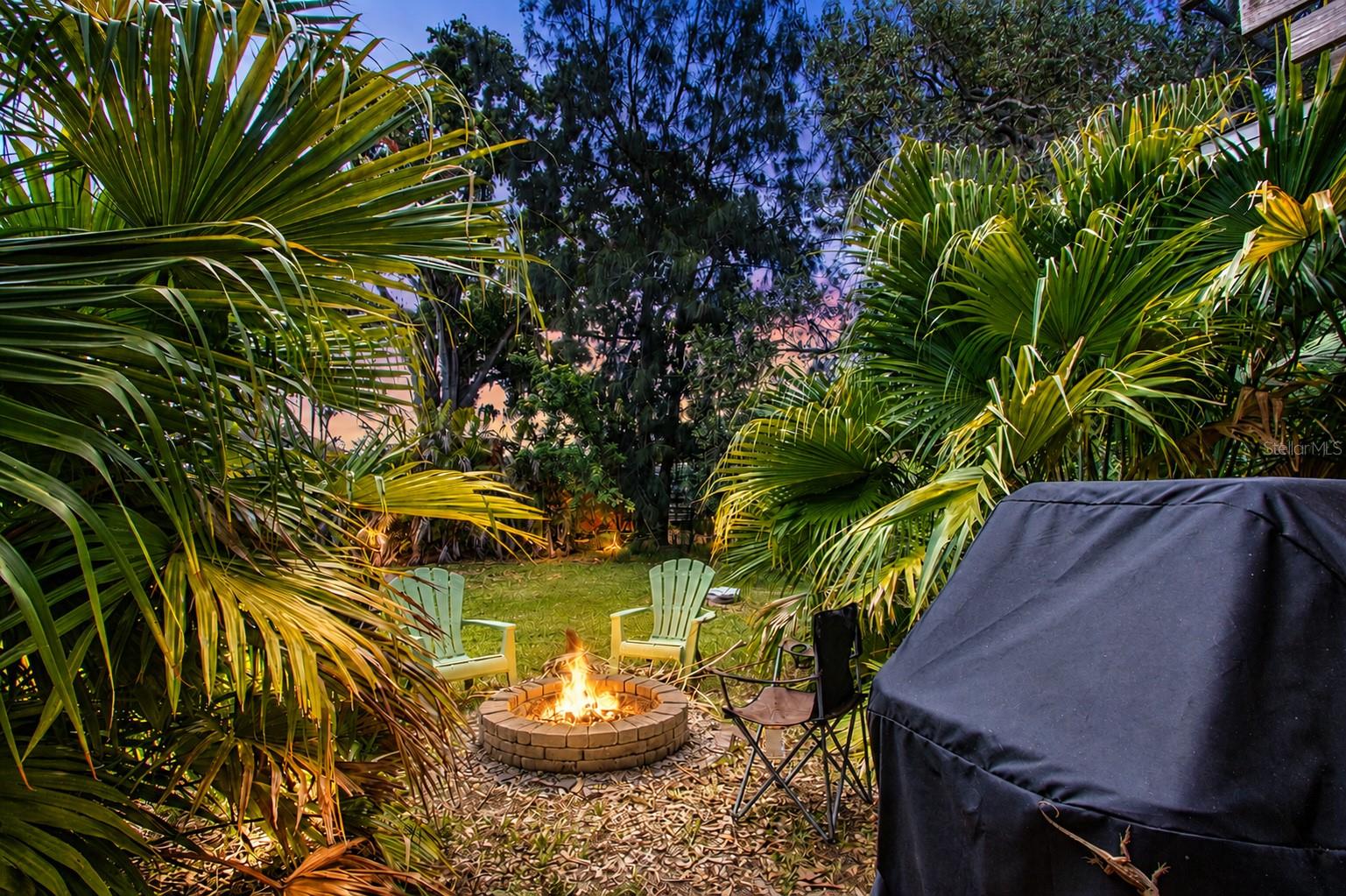 view from pergola to the fire pit