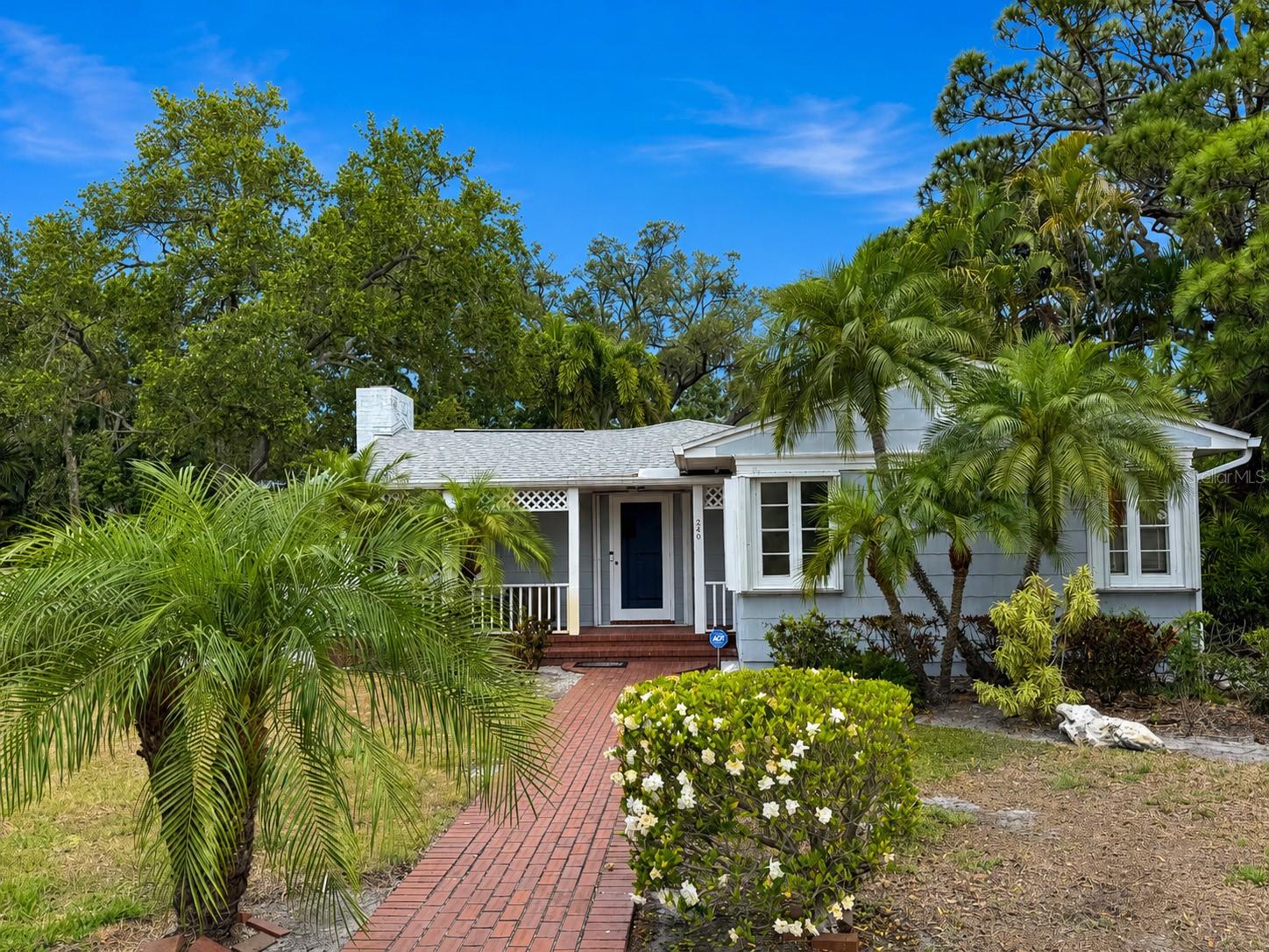 Charming brick walkway and front porch