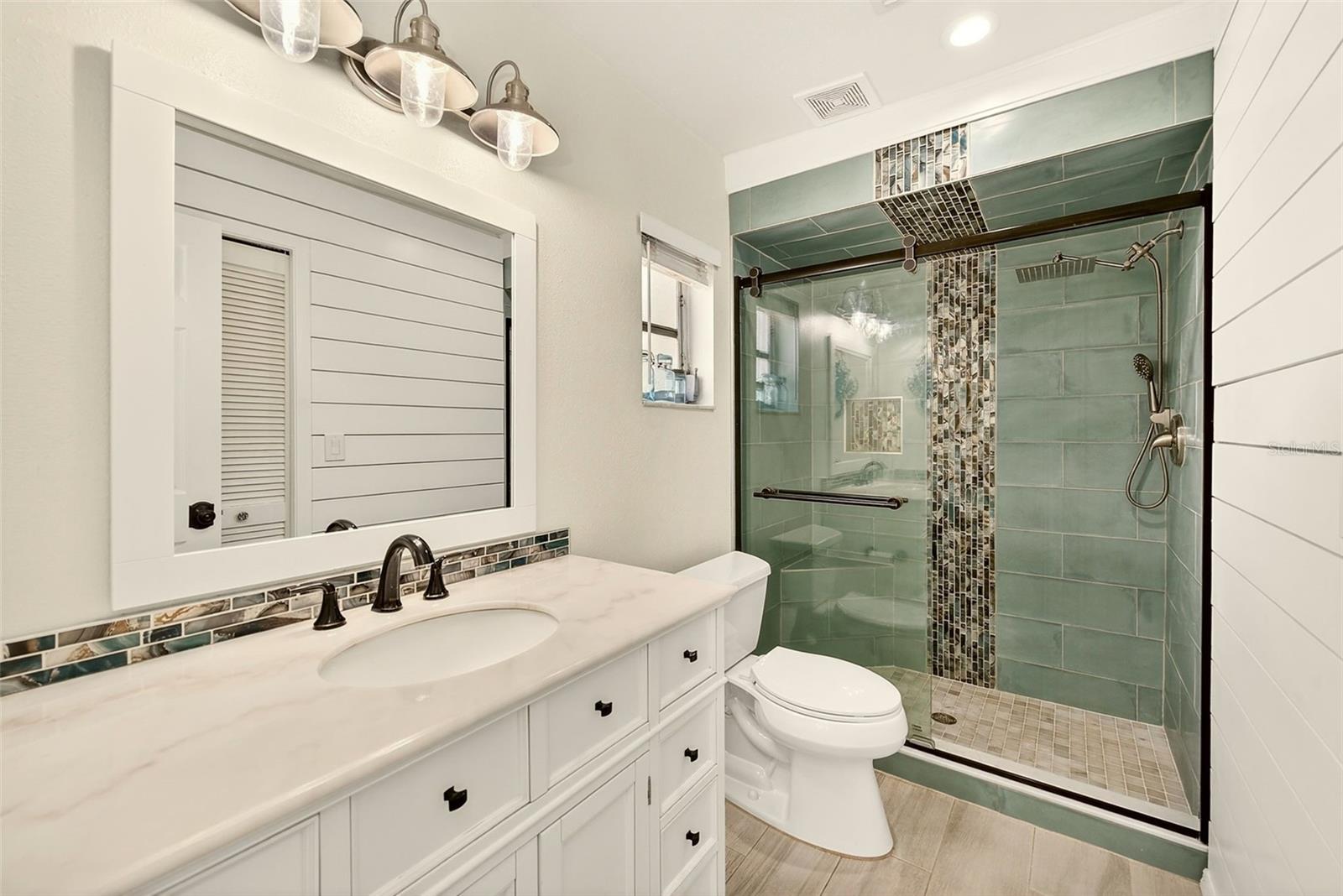Updated bath with walk in shower