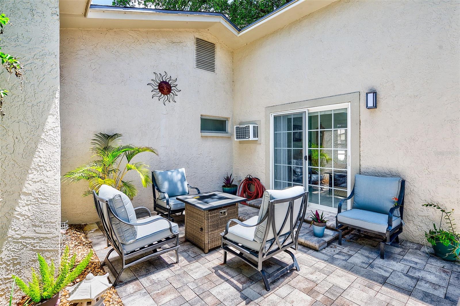 Private patio with direct access to the pool area