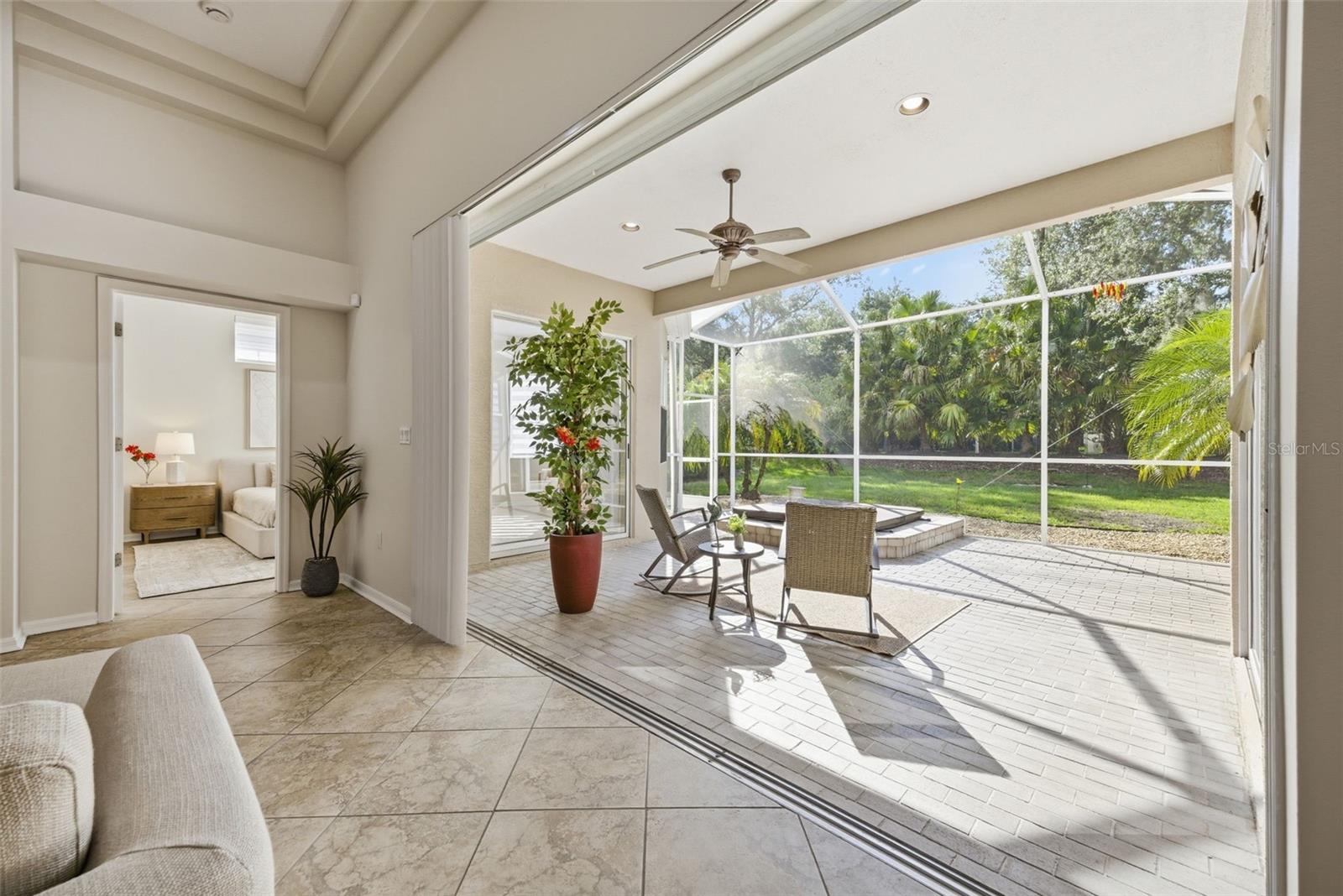 SPACIOUS BRICK SCREENED PATIO
