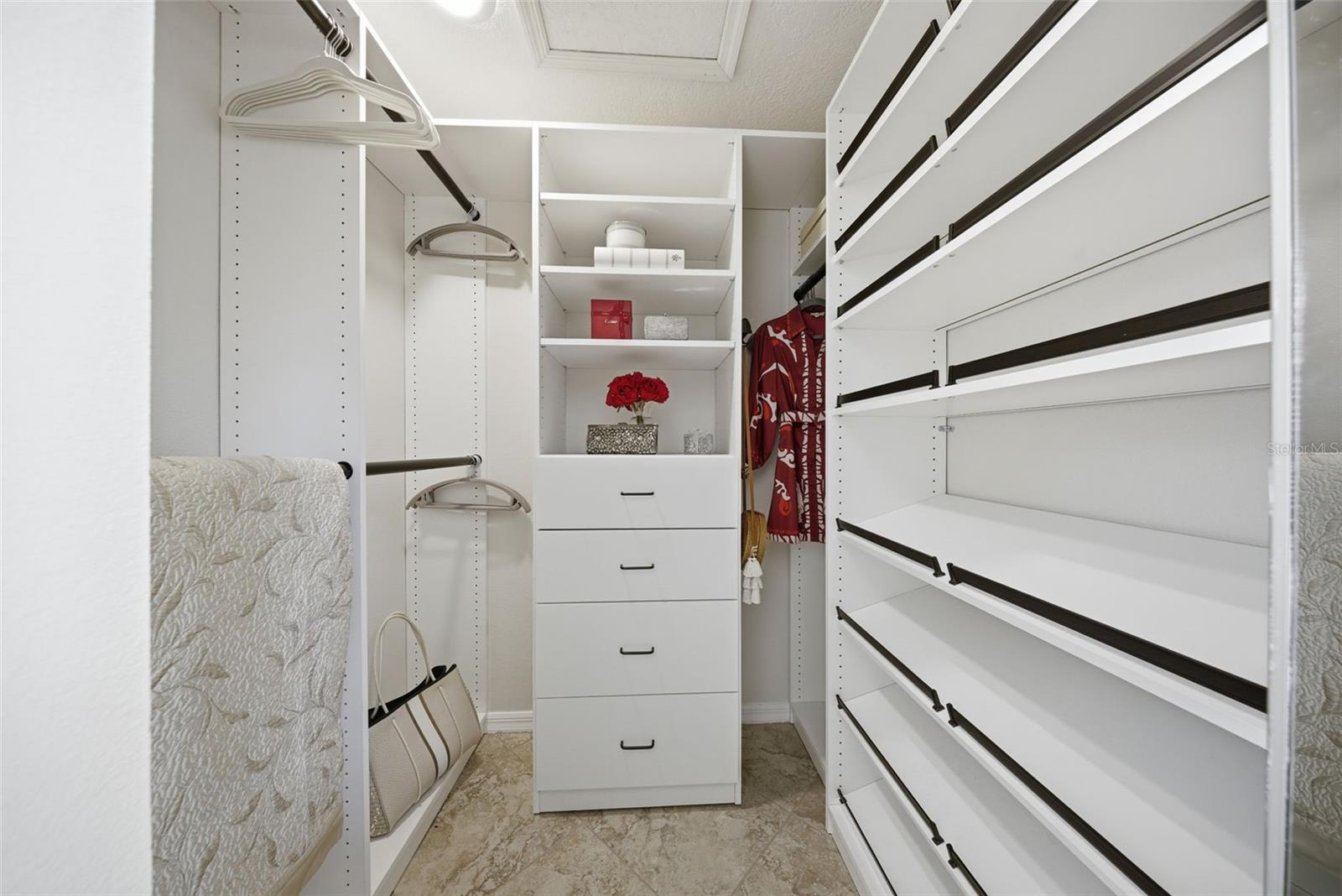 ONE OF THREE WALK IN CLOSETS IN THE PRIMARY RETREAT