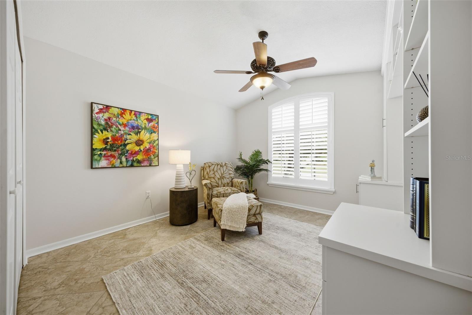 CRISP WHITE BUILT INS IN THIRD BEDROOM COULD SERVE AS AN OFFICE OR HEADBOARD SURROUND