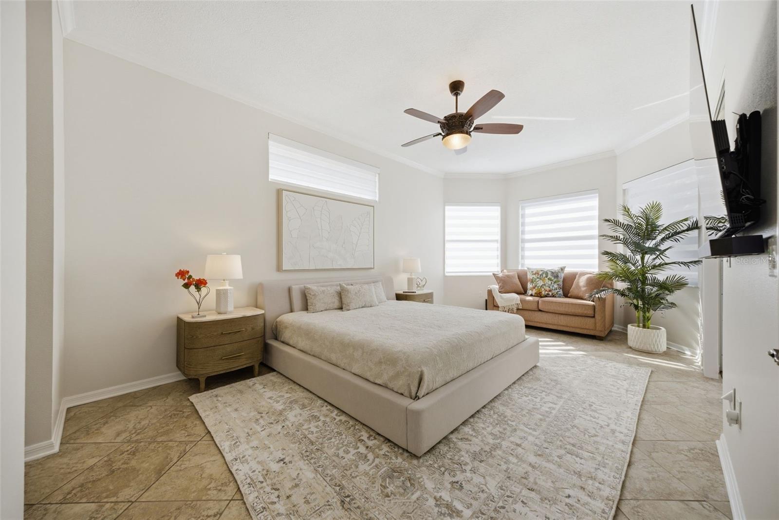 OVERSIZED PRIMARY SUITE WITH PLENTY OF PRIVACY FROM THE SECONDARY BEDROOMS