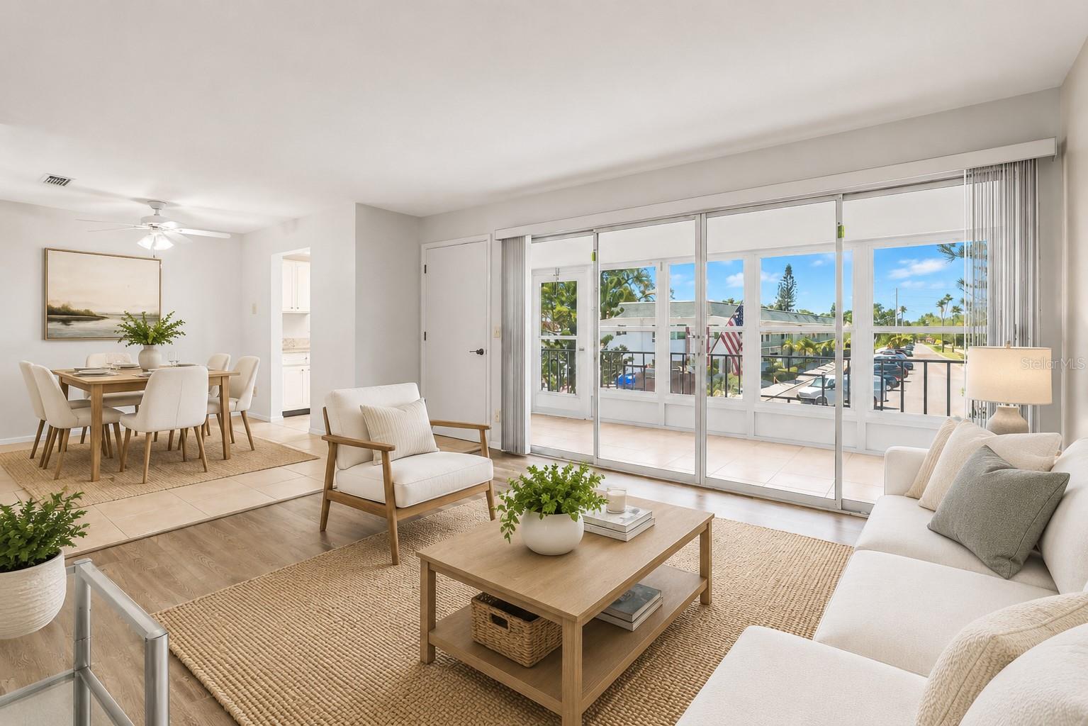 Virtual staging. Living Room with wall of sliders to oversized lanai