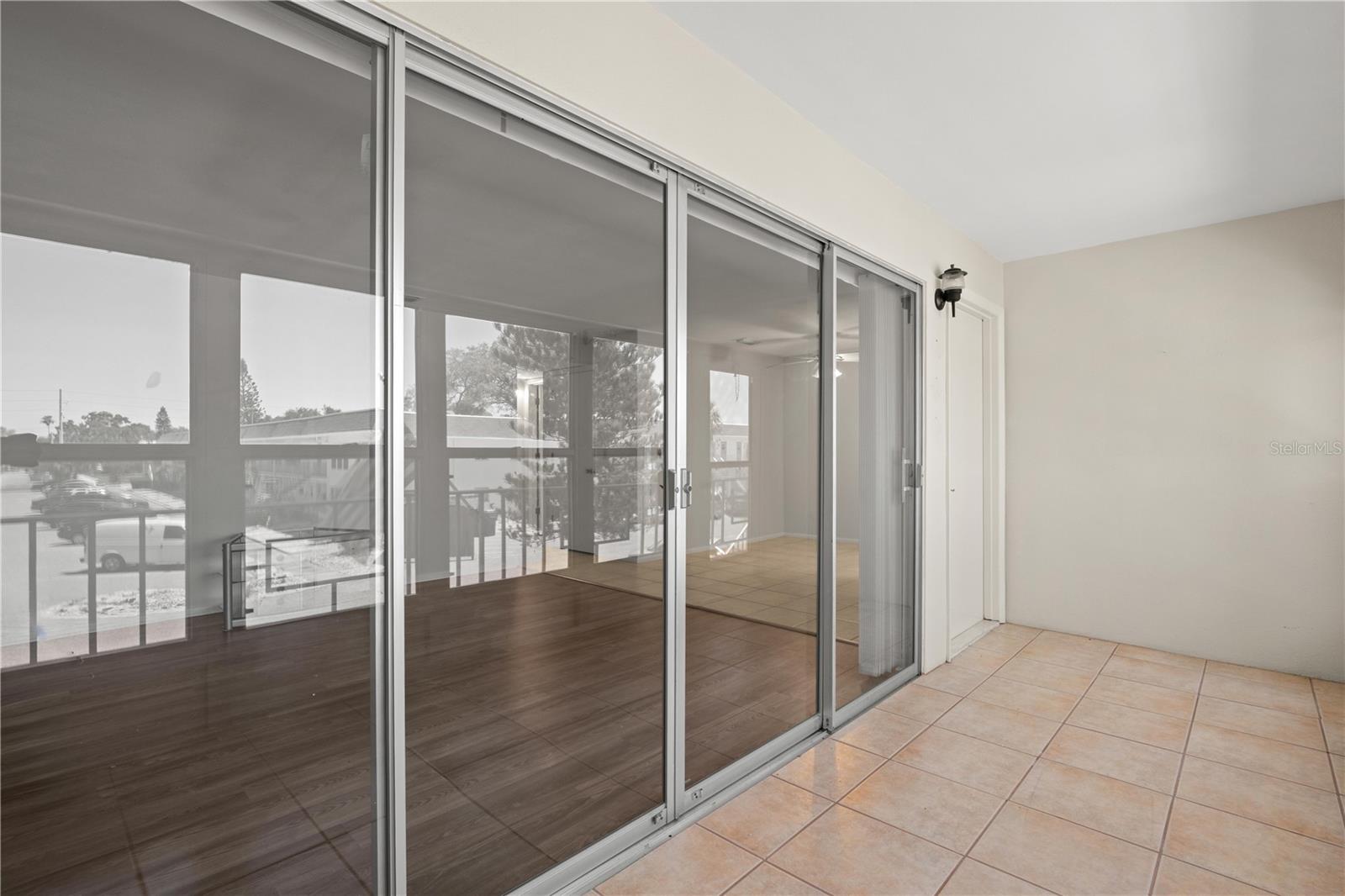 Wall of sliders from living room onto oversized lanai