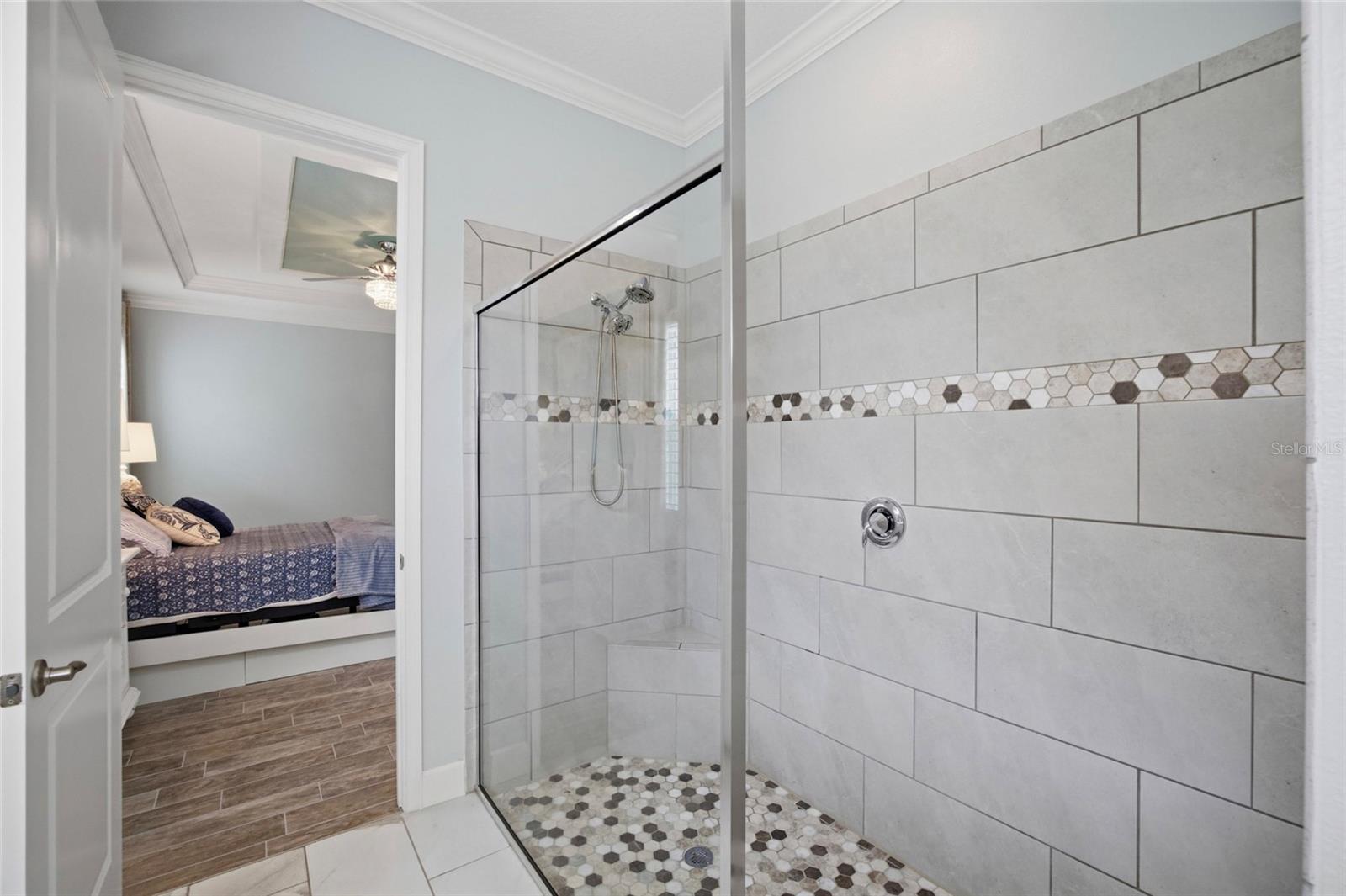 Primary bathroom large tiled walk-in shower