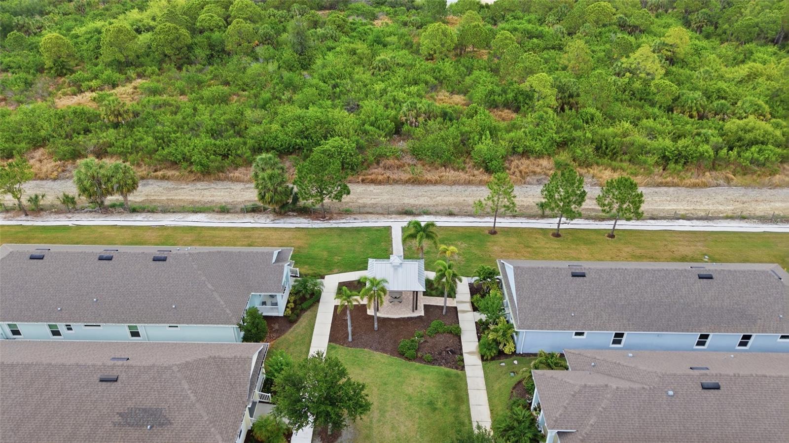 Front yard green space gazebo that overlooks the conservation area and walking trail