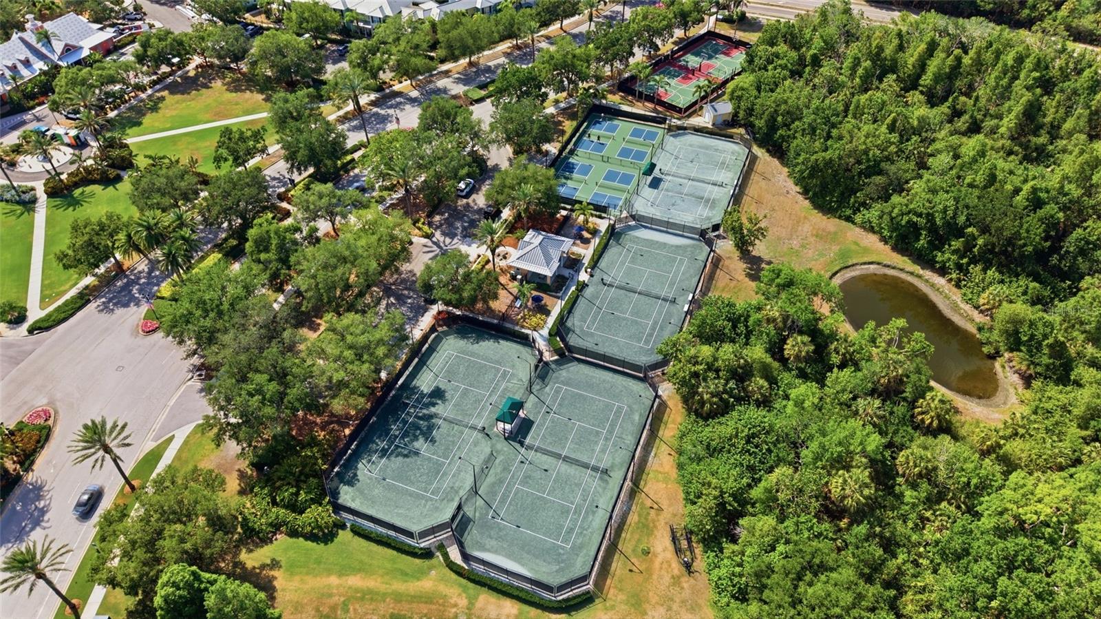 Mirabay tennis, pickleball & basketball courts across from the amenity center.