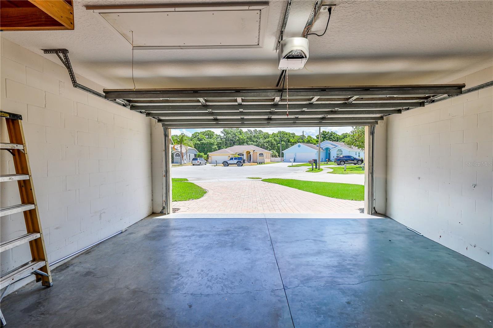 Oversize 2 car garage. Garage door opener with keypad and remote controls.