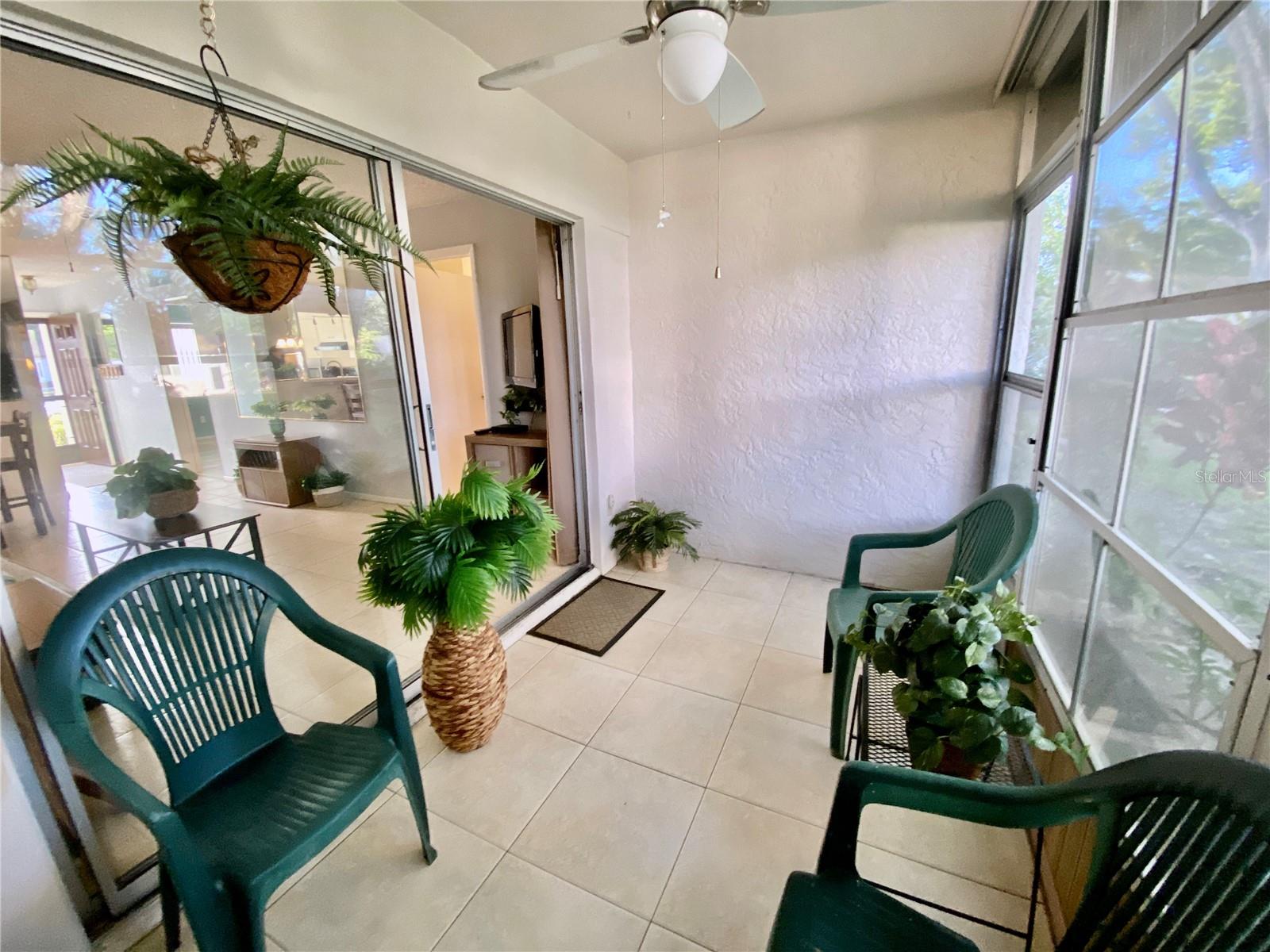 All season Florida Room leads to Courtyard