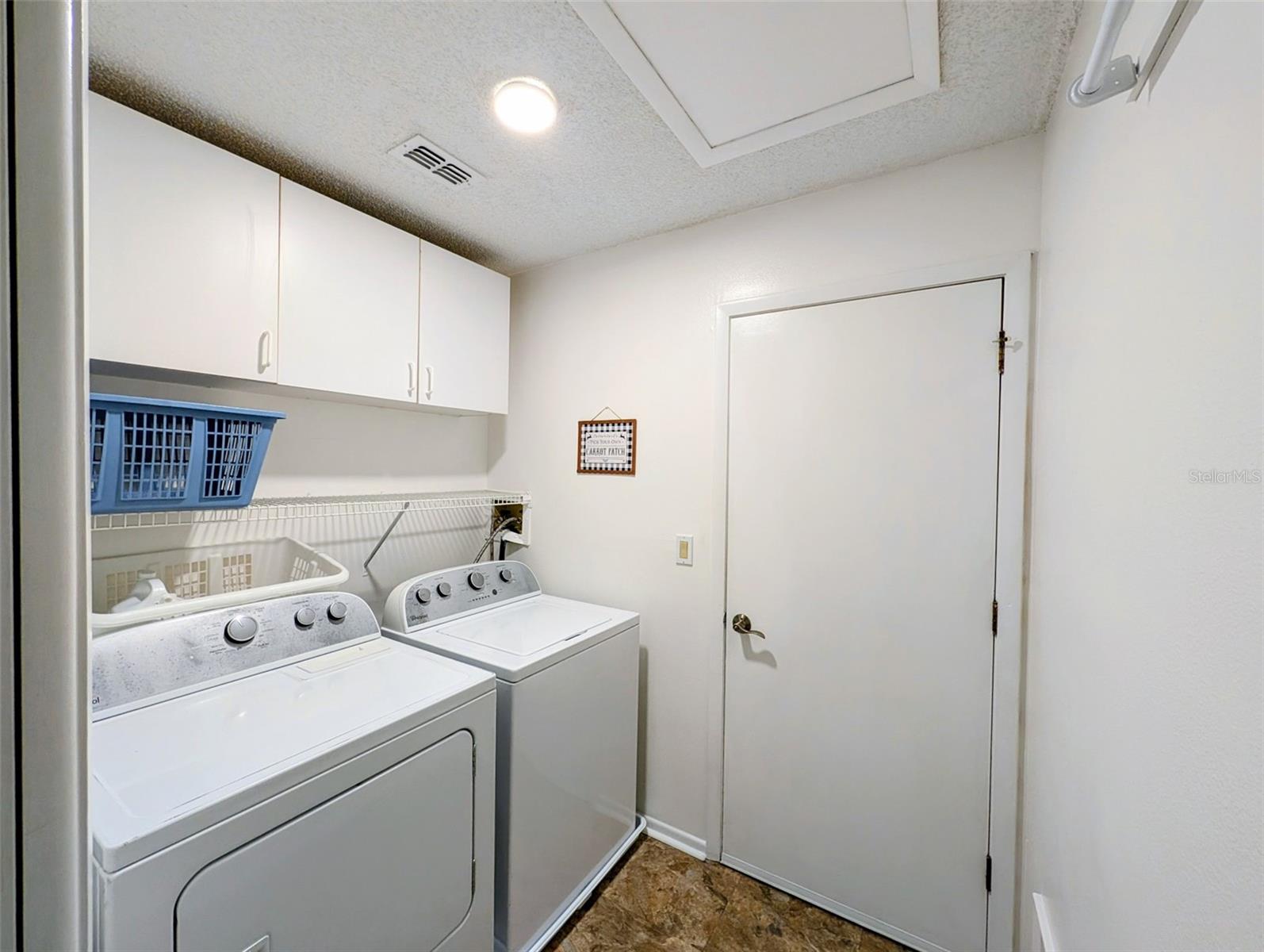 Laundry room with garage access