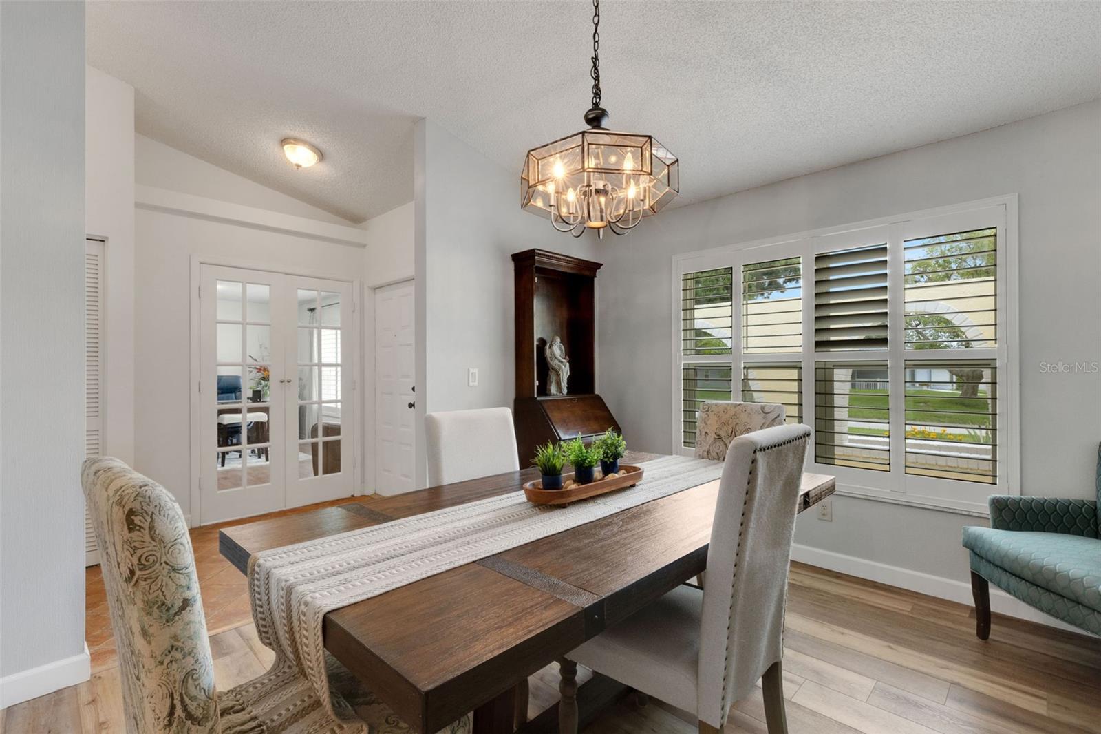 Dining Room with view of foyer and French doors to living room