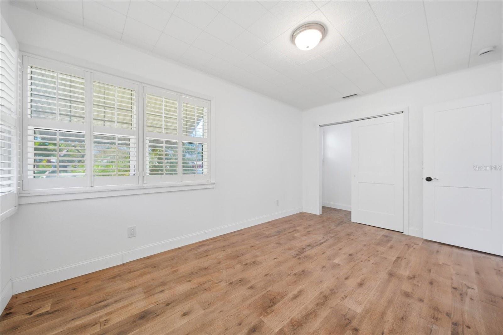 Primary Bedroom facing the Walk in Closet