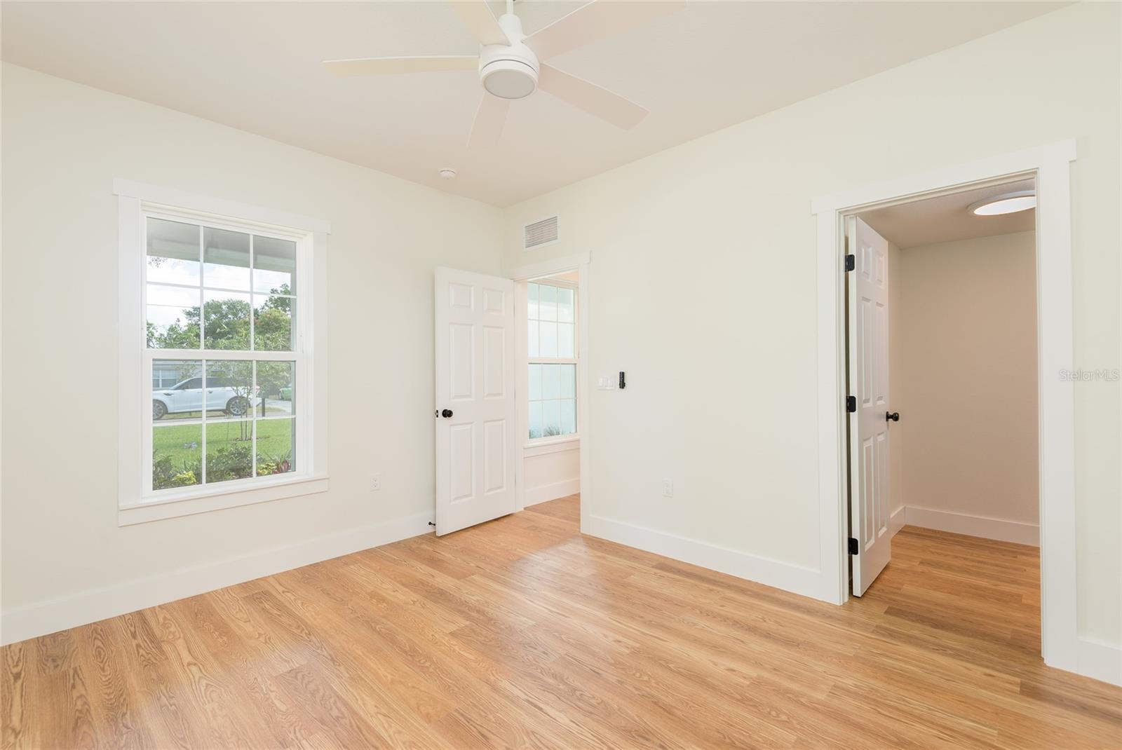 Large walk-in closet in bedroom
