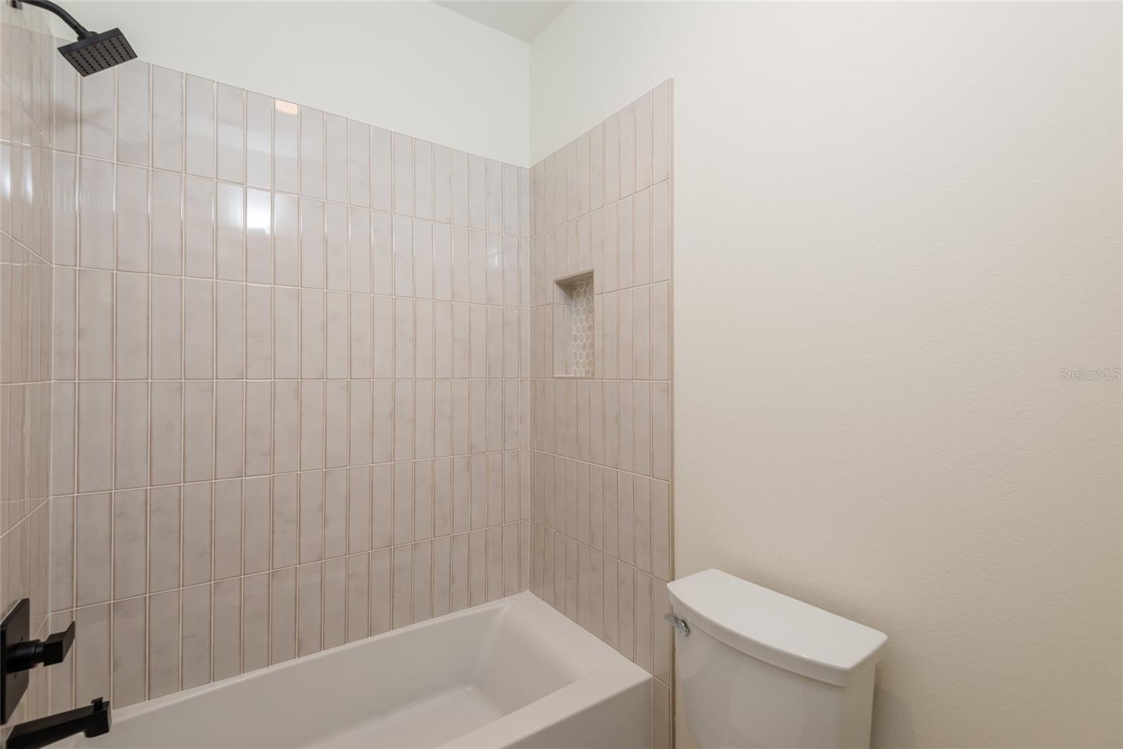 Separate toilet and shower/tub