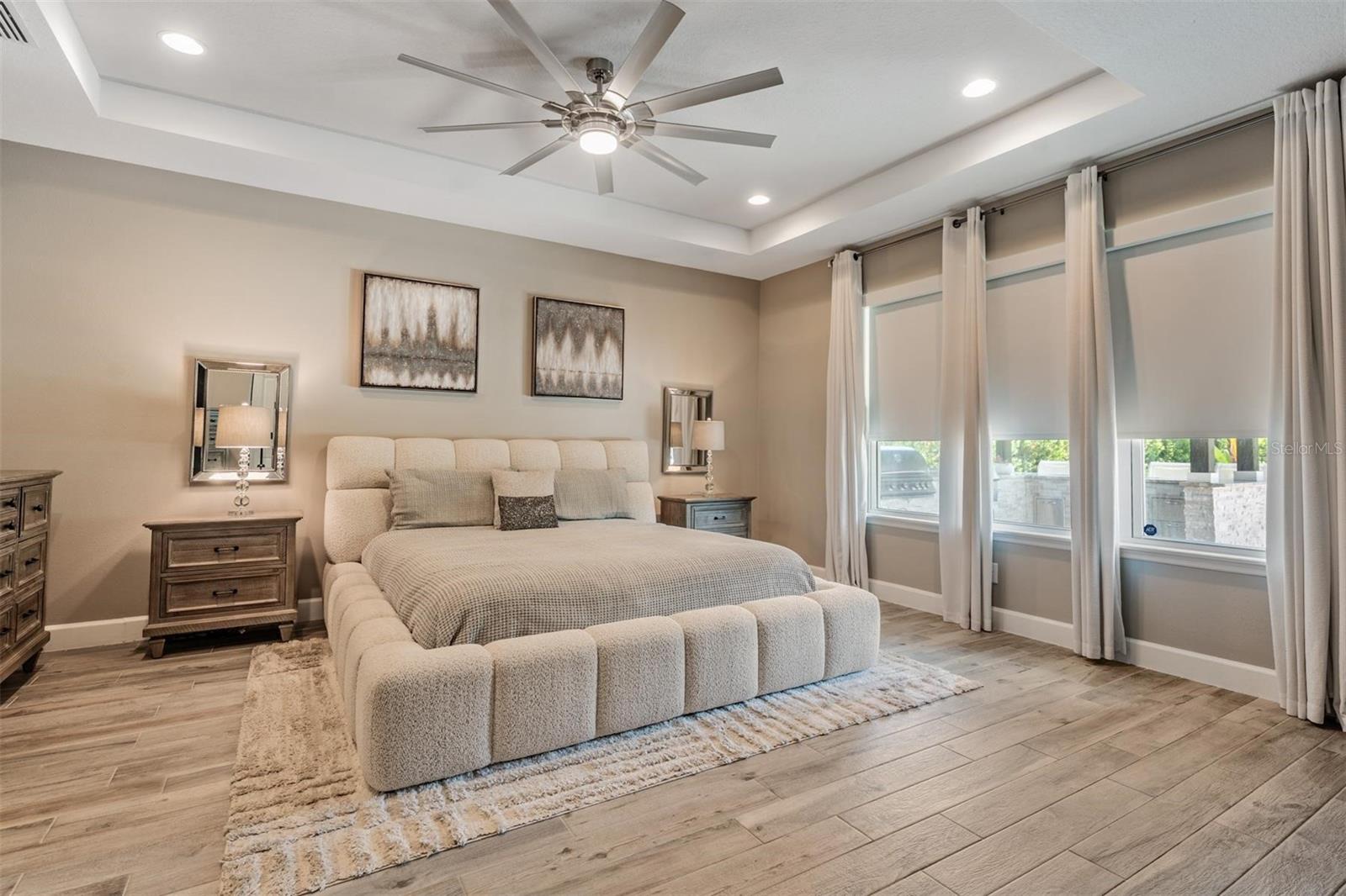 Master bedroom features a wall of windows