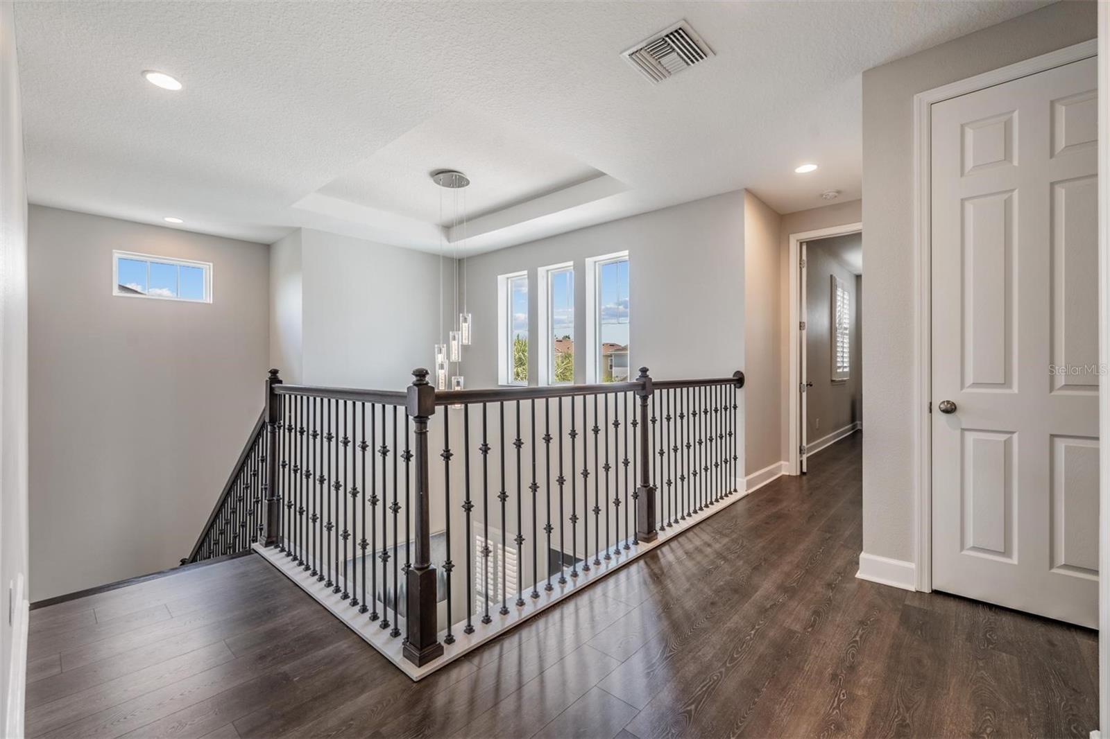 Second floor landing with designer railing