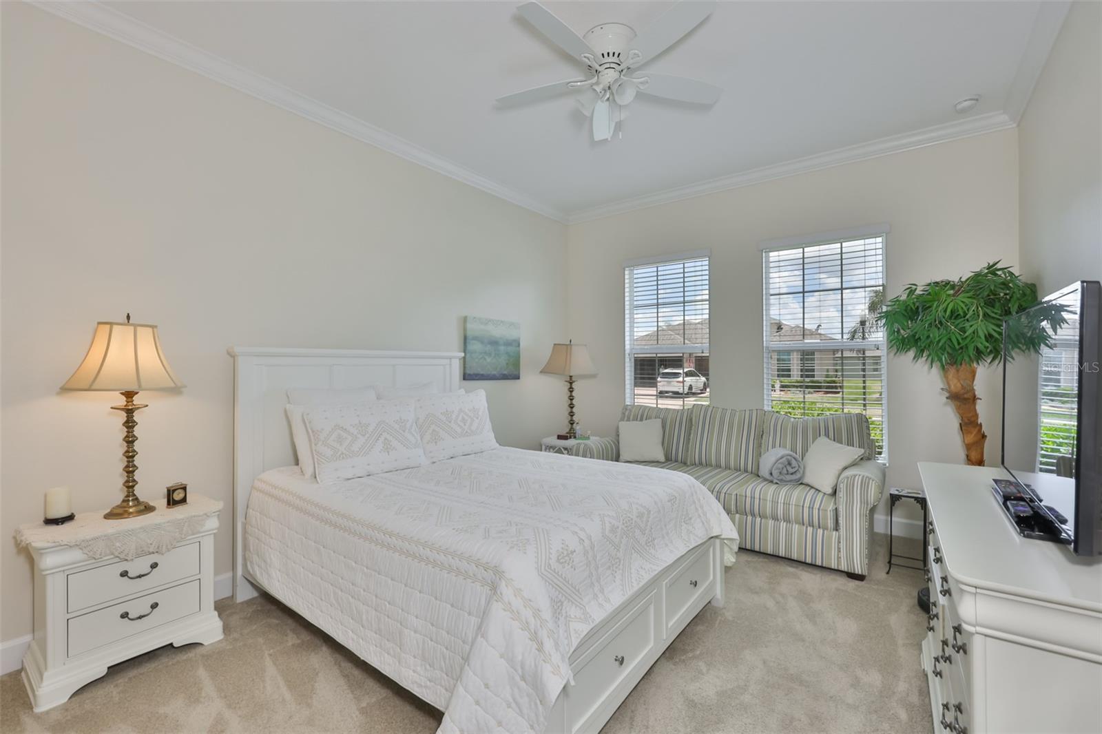 Bedroom #2 boasts large windows and has a wonderfully spacious feel.  The carpet is new and was added as a luxury item.