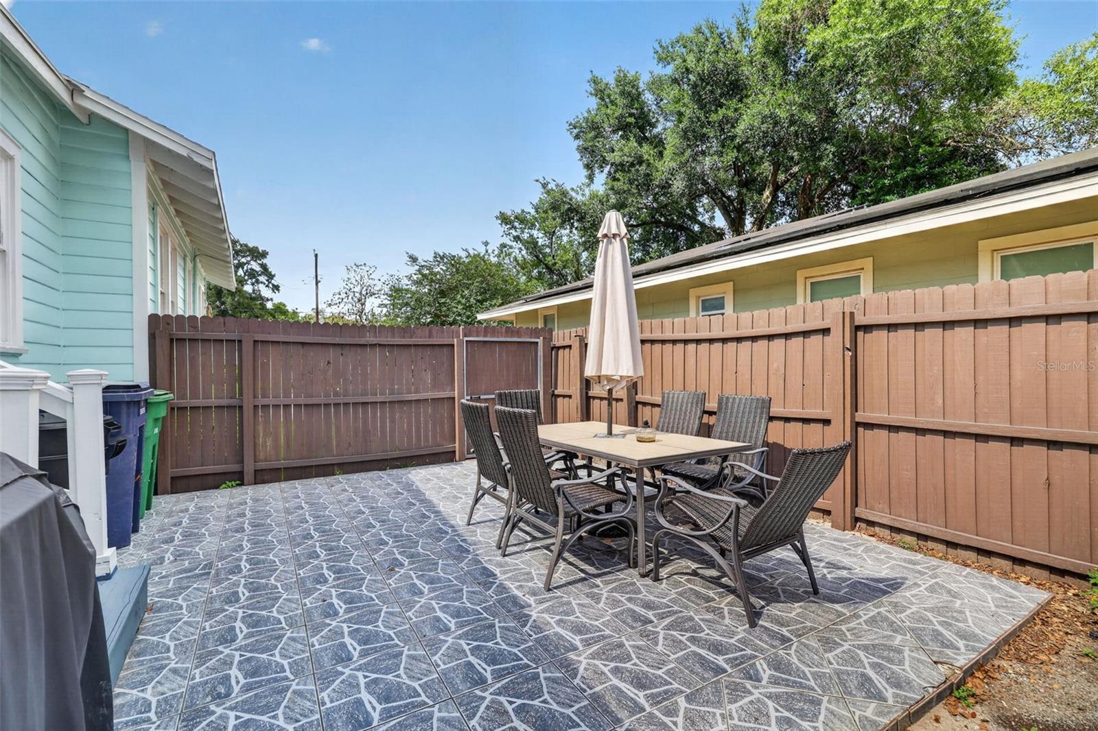 Spacious outdoor patio area perfect for outdoor seating and entertainment