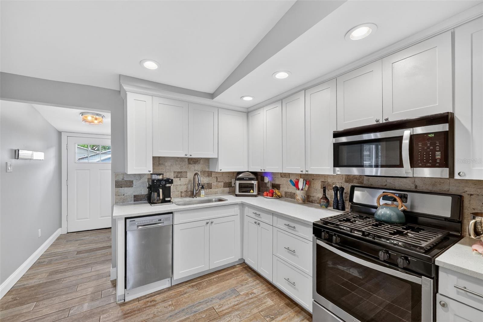 Bright kitchen with white cabinetry
