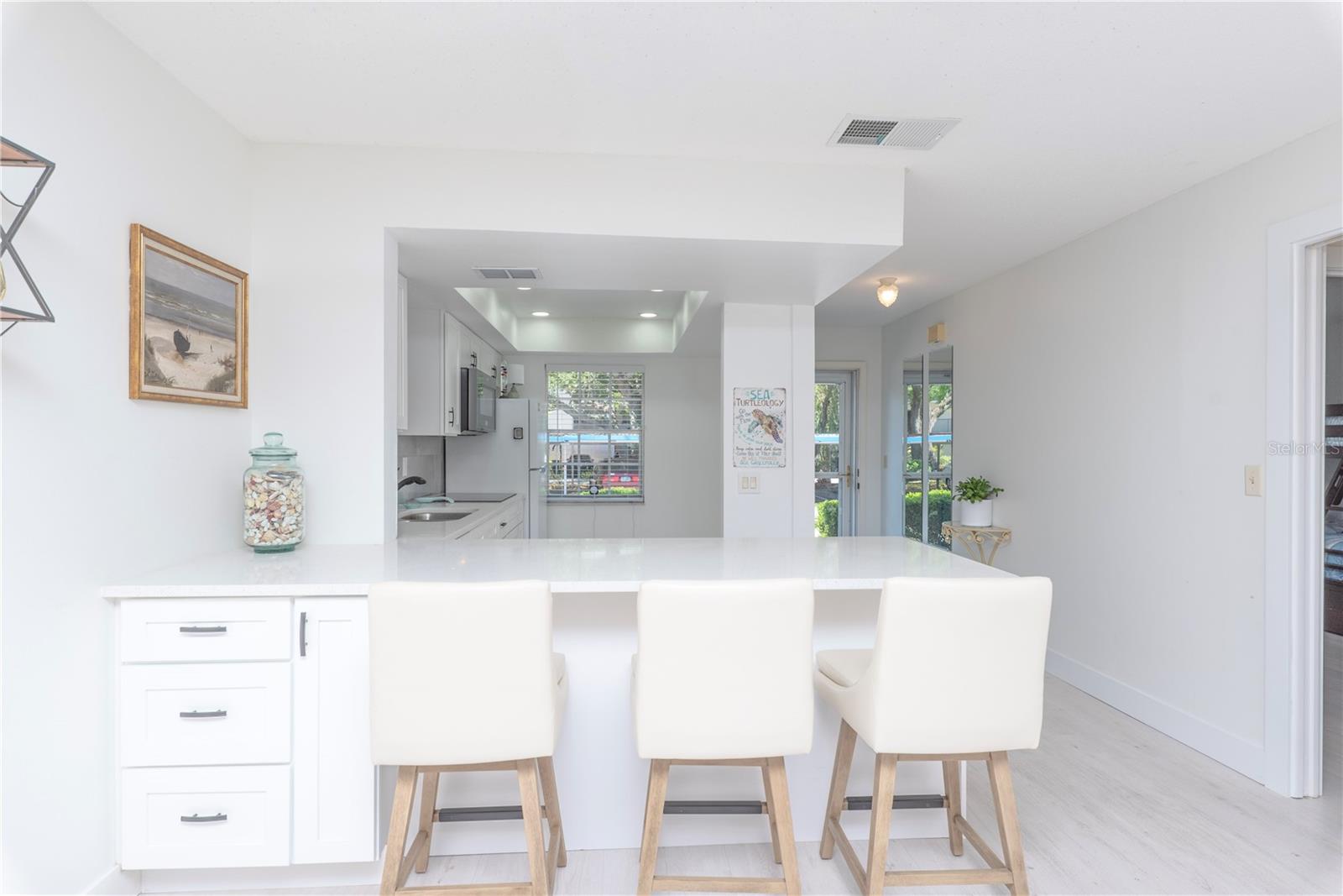 Breakfast bar and kitchen.