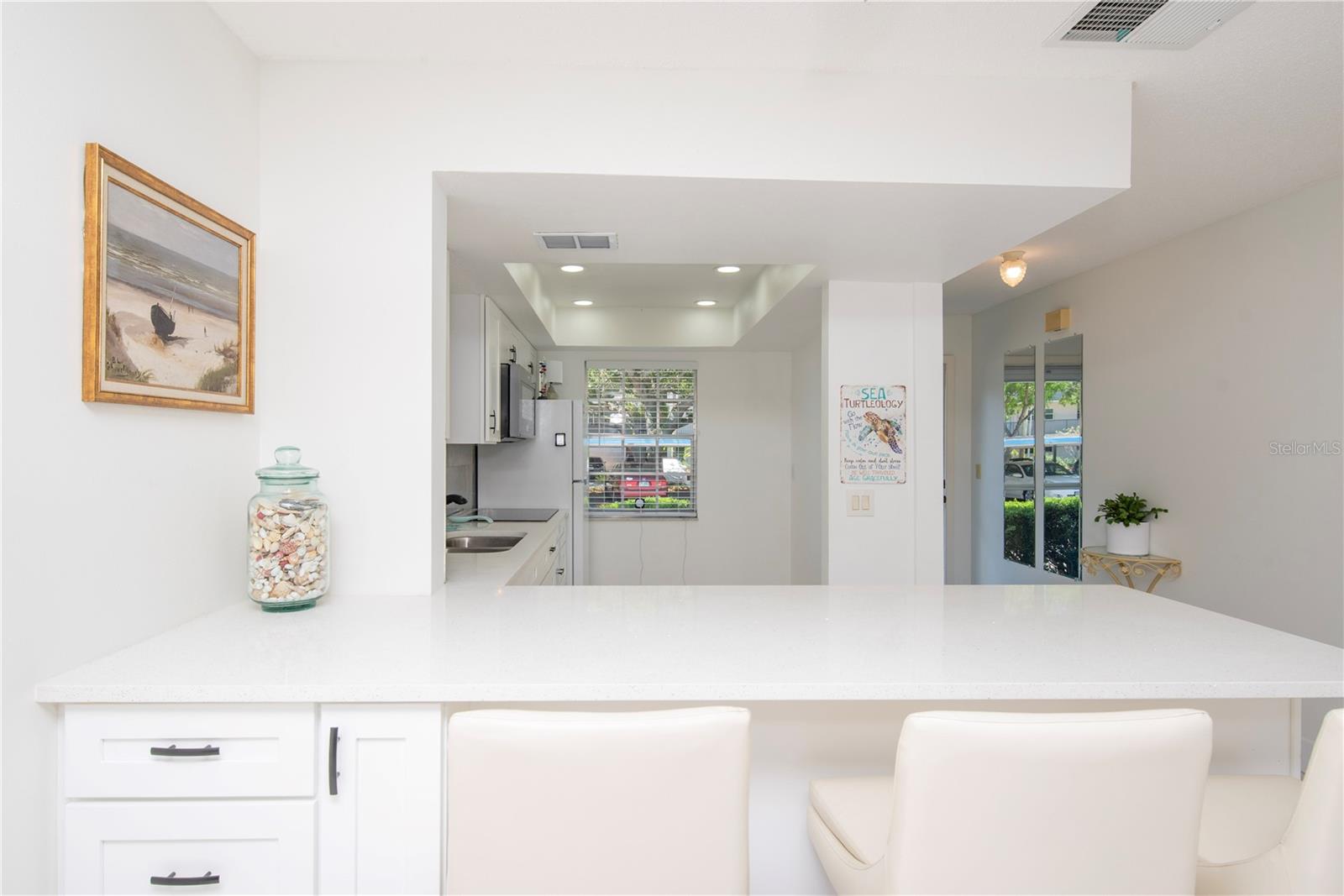 Breakfast bar and kitchen with great storage.