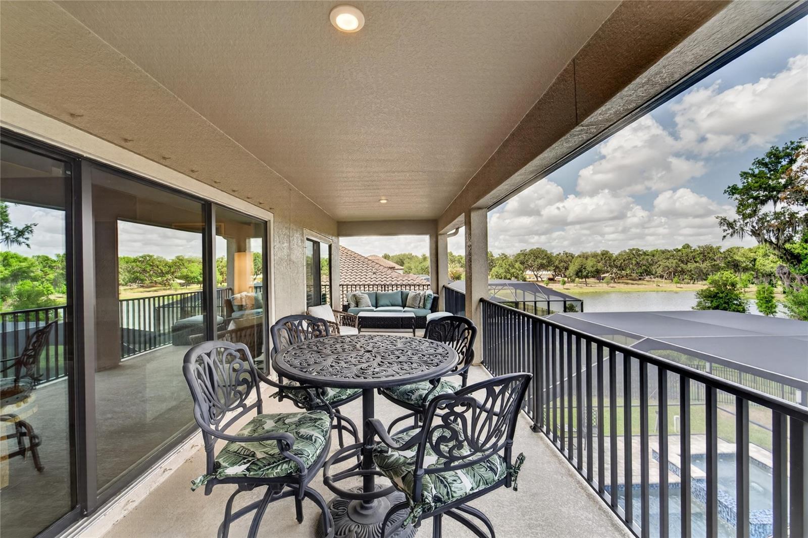 Second story patio with a view to conservation and pond.