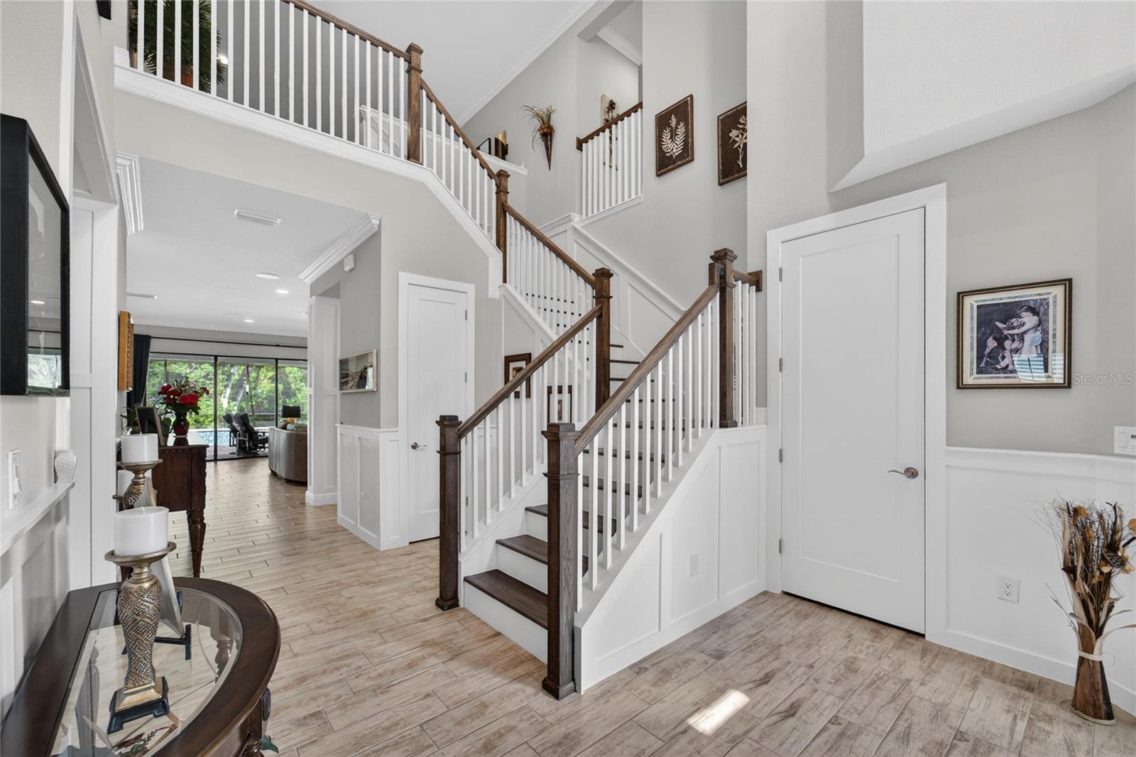 Look at the beautiful crown molding, woodwork and wainscoating throughout the home.