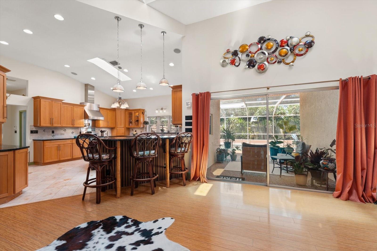 View of Kitchen and View of Back Patio/Pool