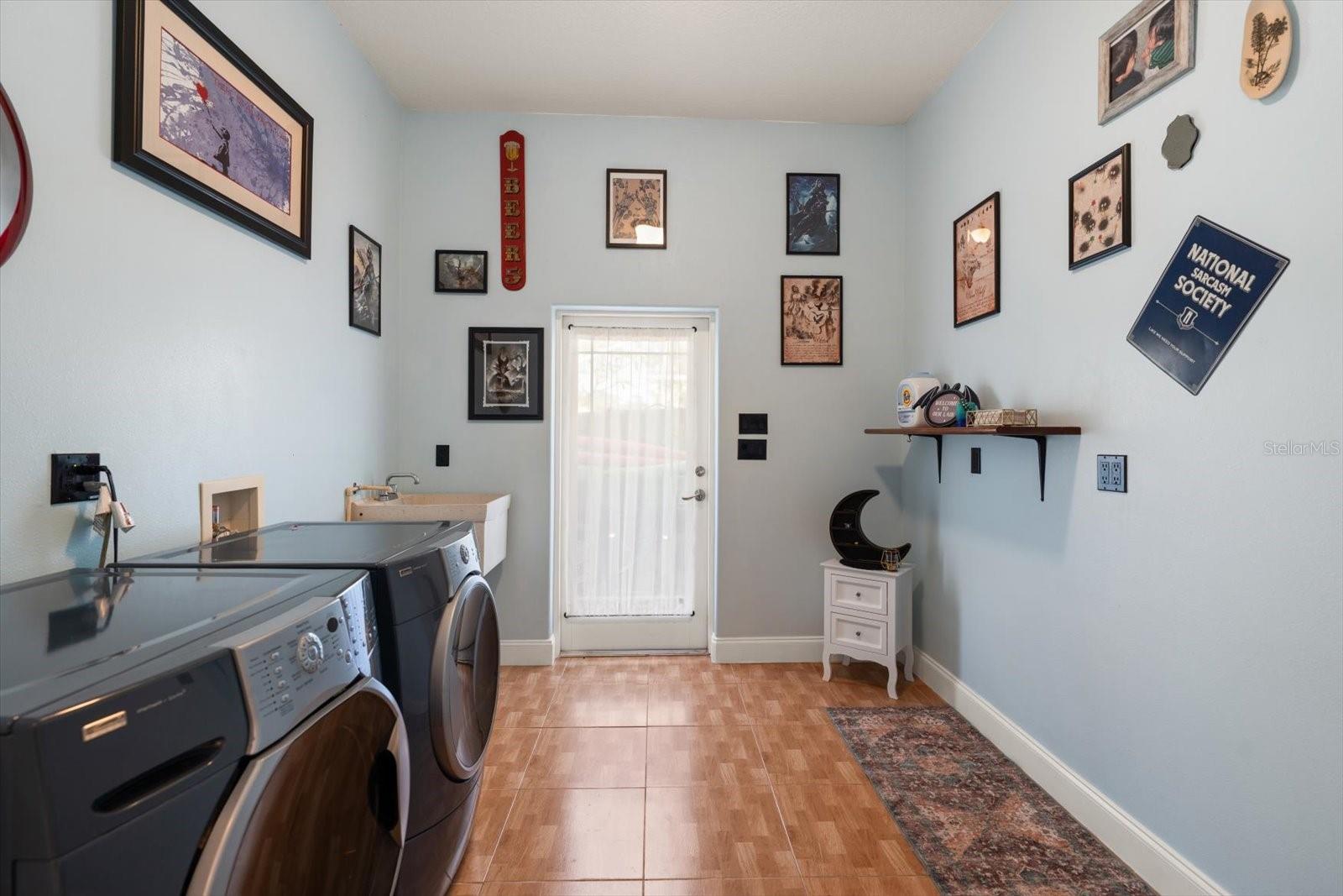 Laundry Room with Door to Pool Area