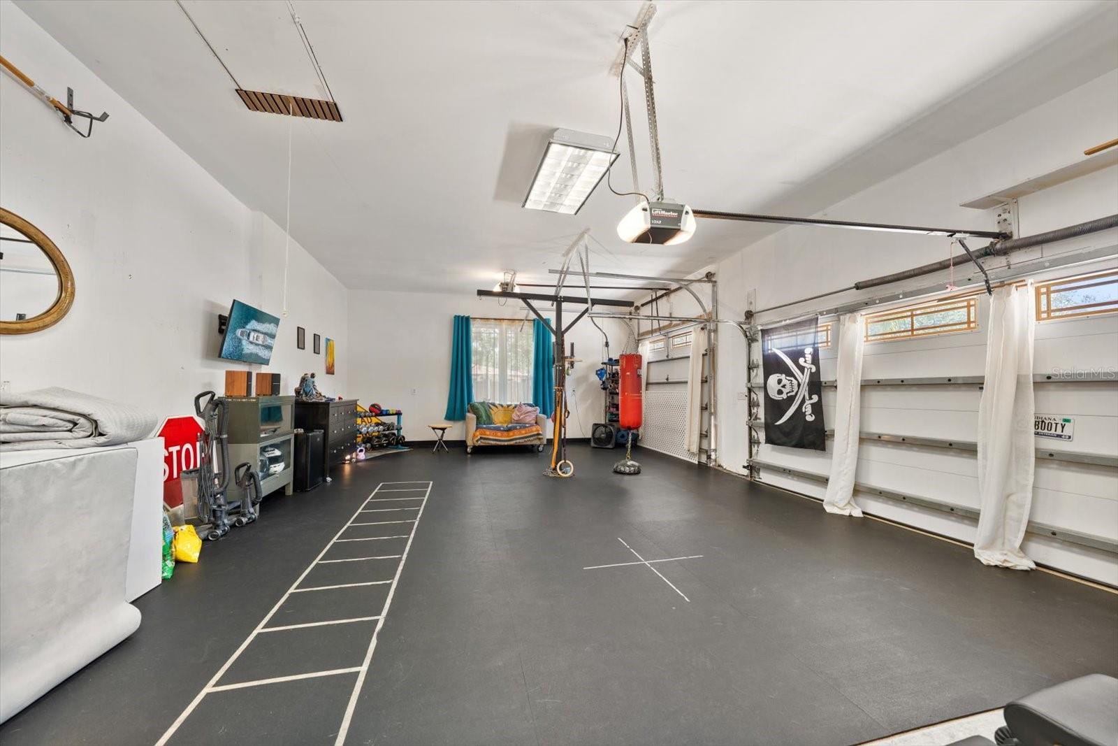 3 Car Garage with Rubber Flooring