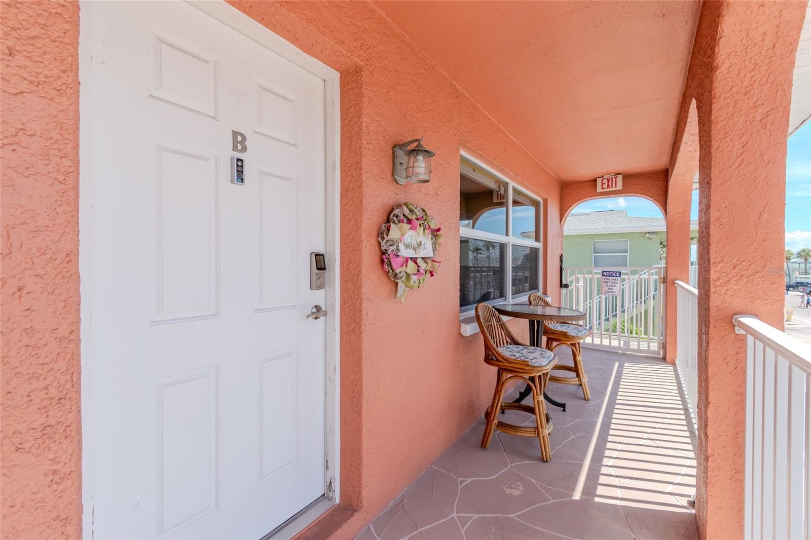 FRONT BALCONY/DOOR TO UNIT 1B