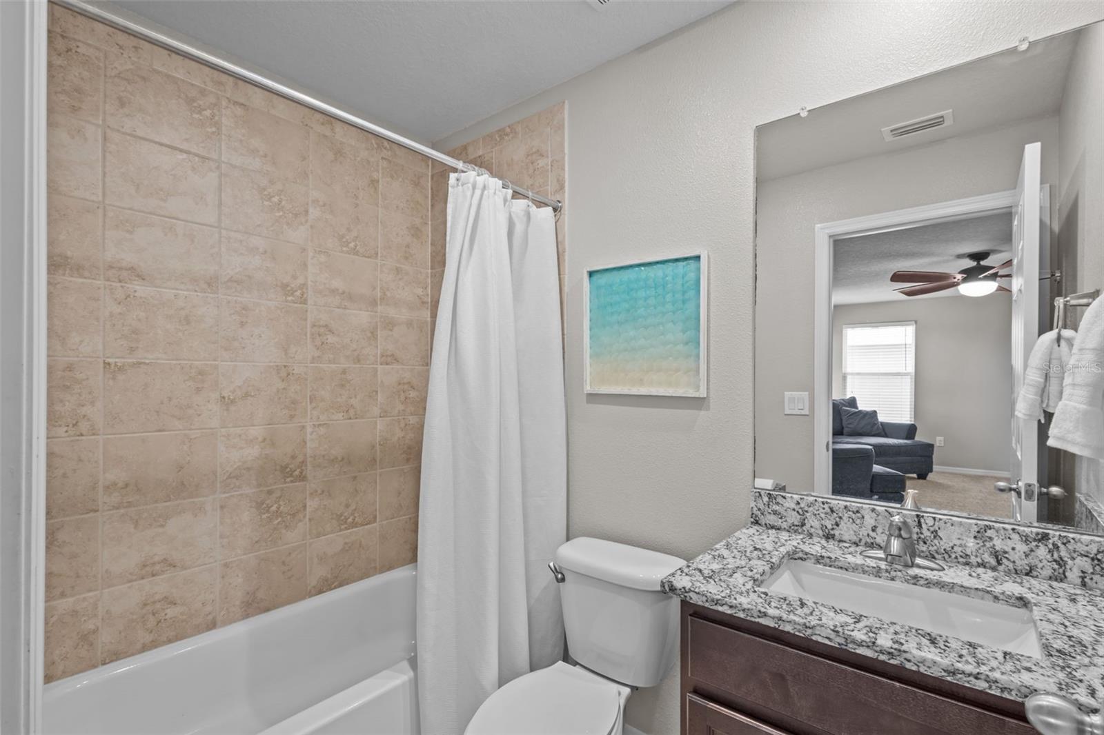 Two full upstairs bathrooms provide added convenience for the secondary bedrooms and loft.