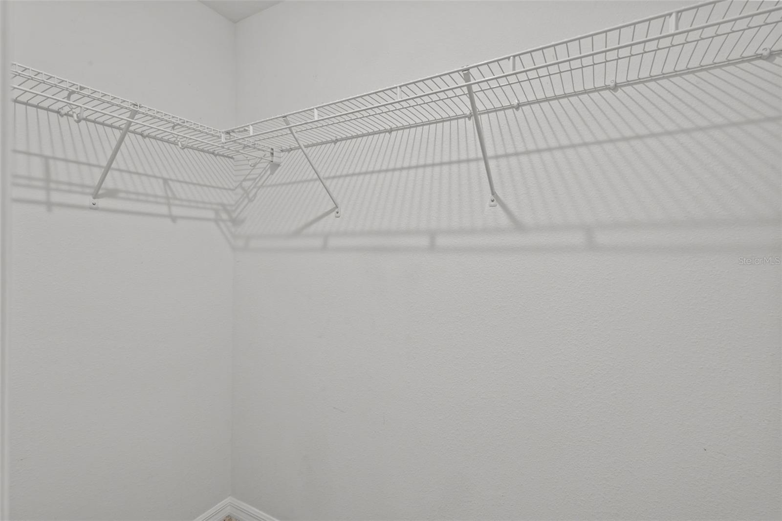 One upstairs bedroom includes a walk-in closet for additional storage