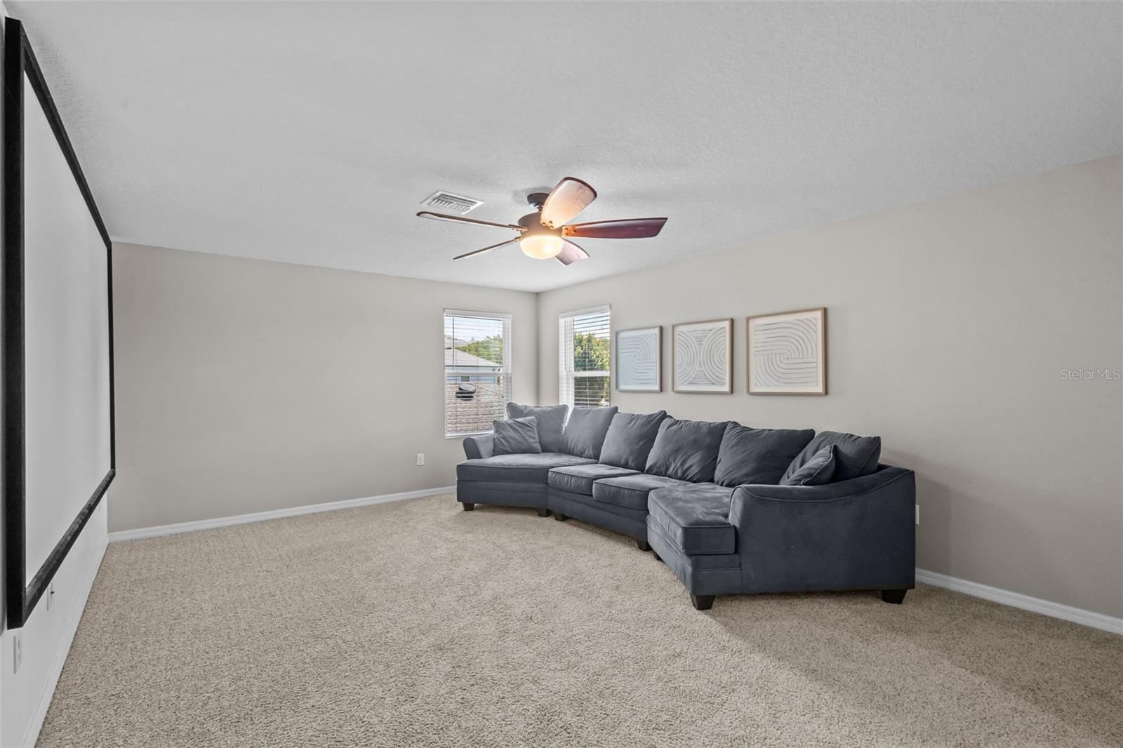 Oversized upstairs loft provides an impressive second living area